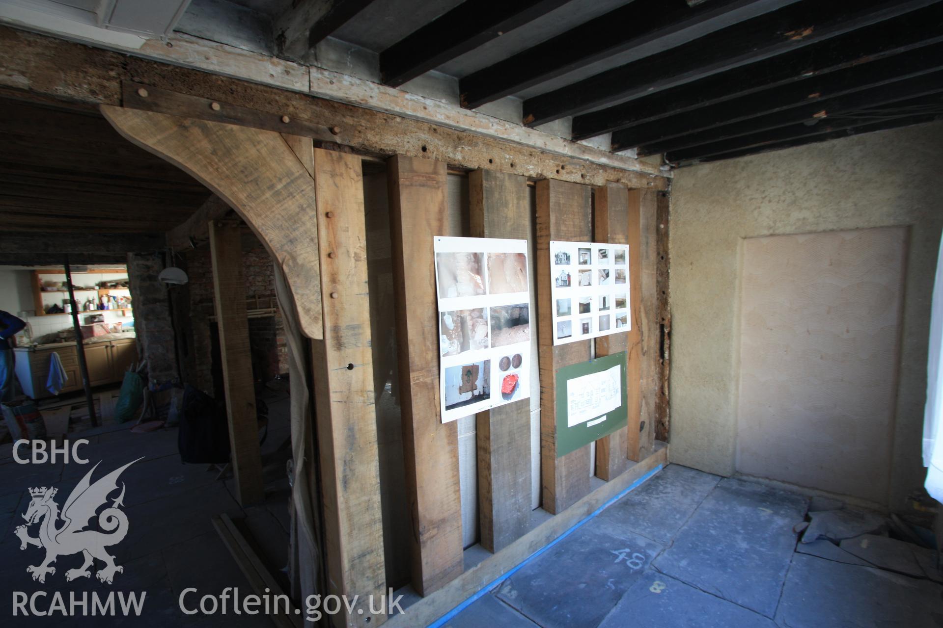 Interior: repair work to timber framing and insertion of new studs.