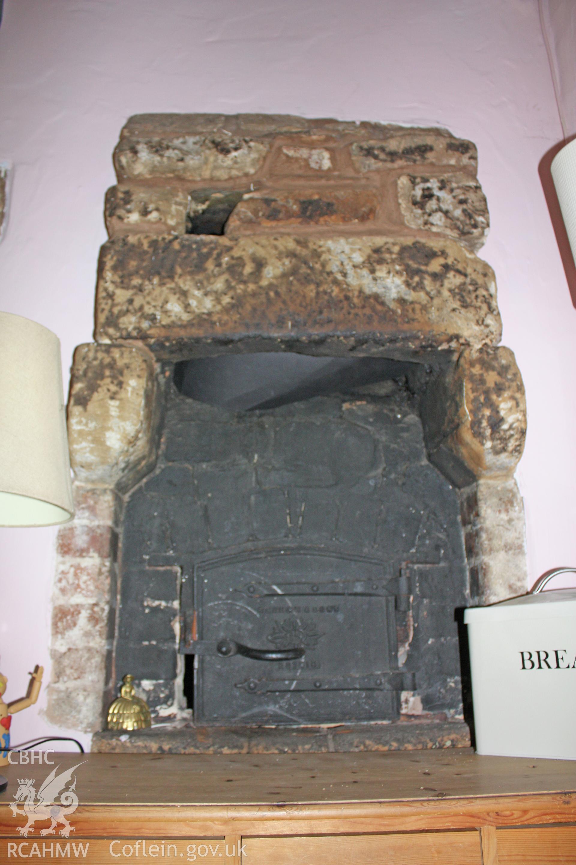 Oven with corbelled flue in single story wing end gable