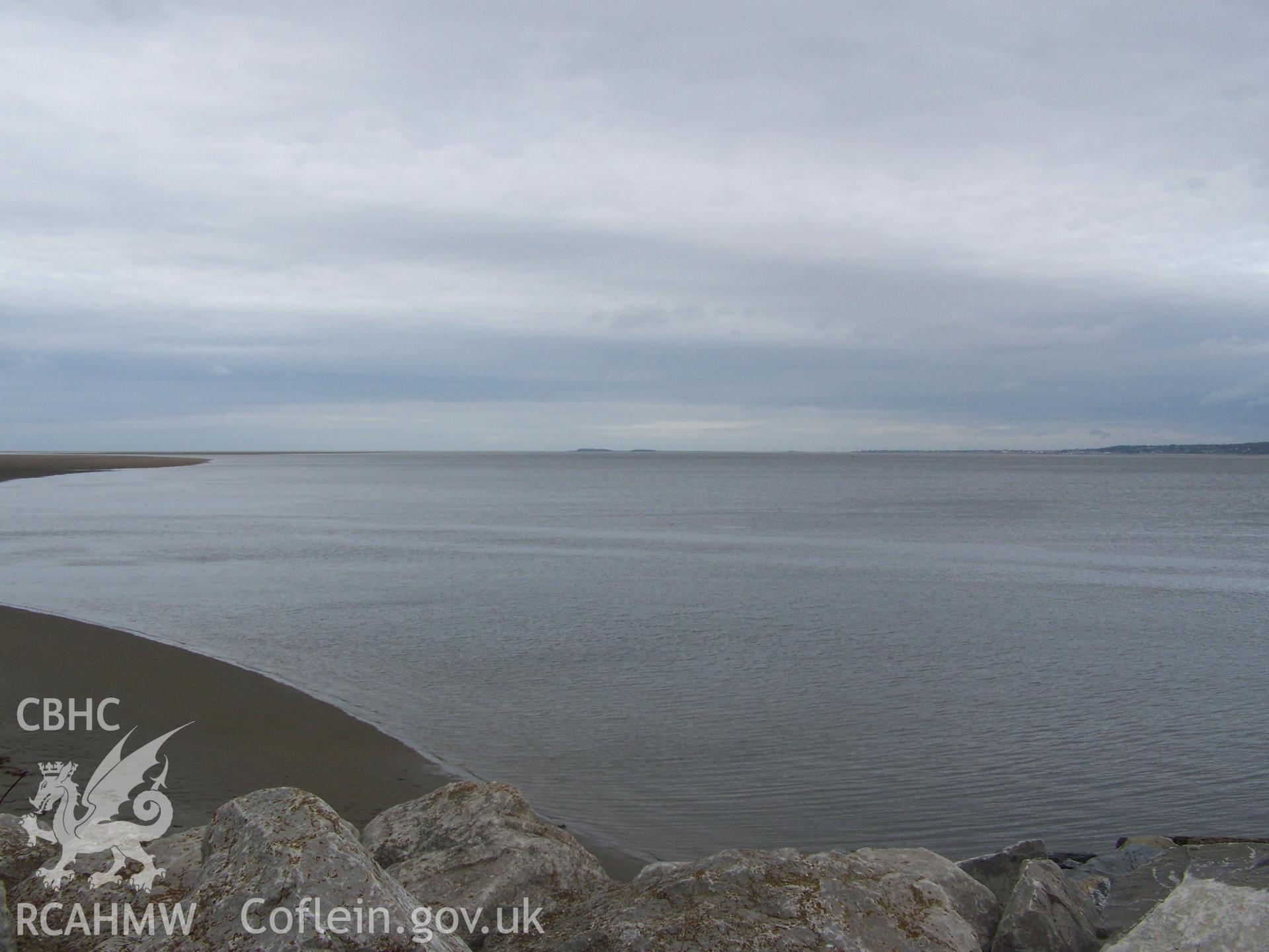 View from the mouth of the harbour westward with Hilbre island in the centre  far distance