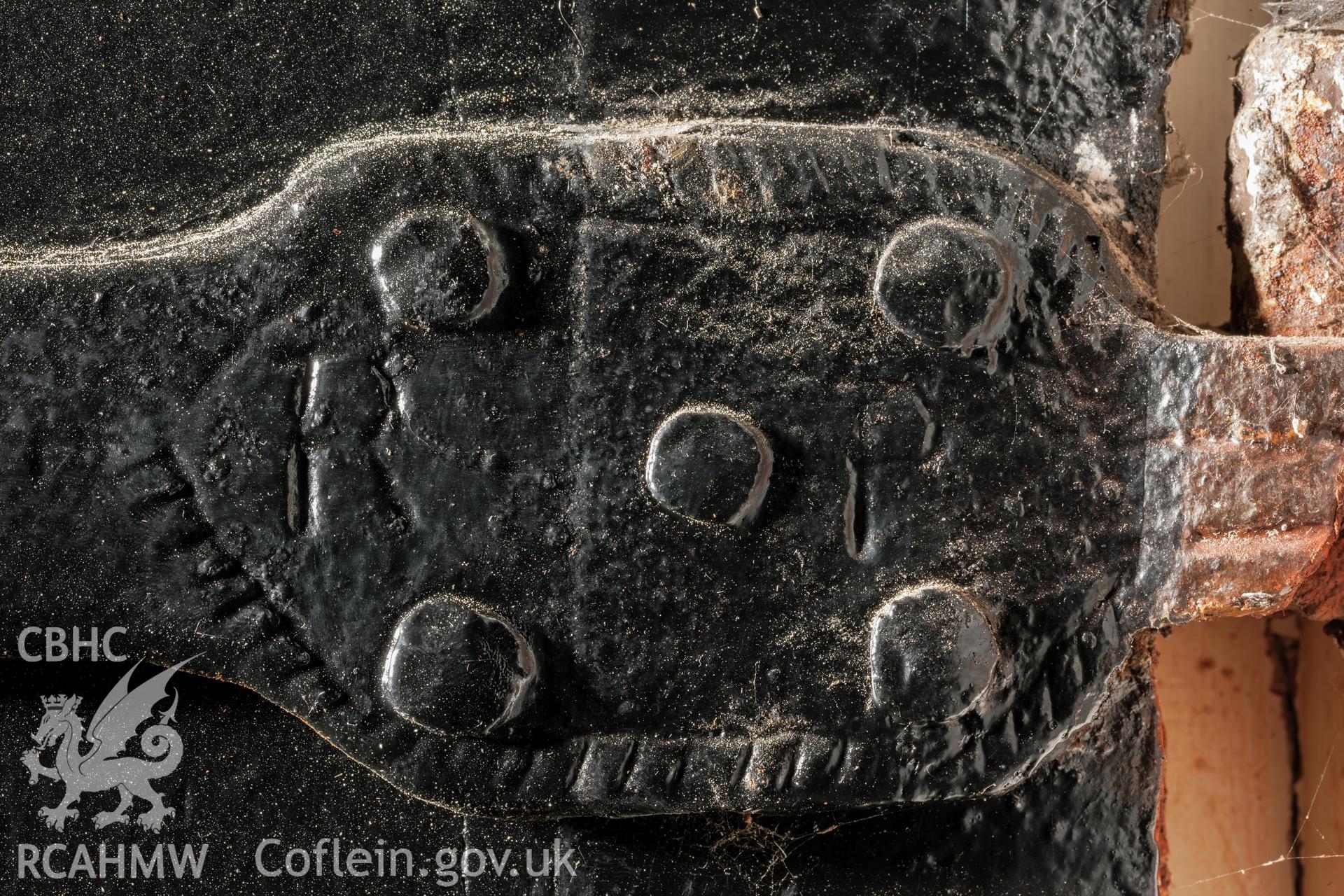 Detail of inscription, R P, on hinge