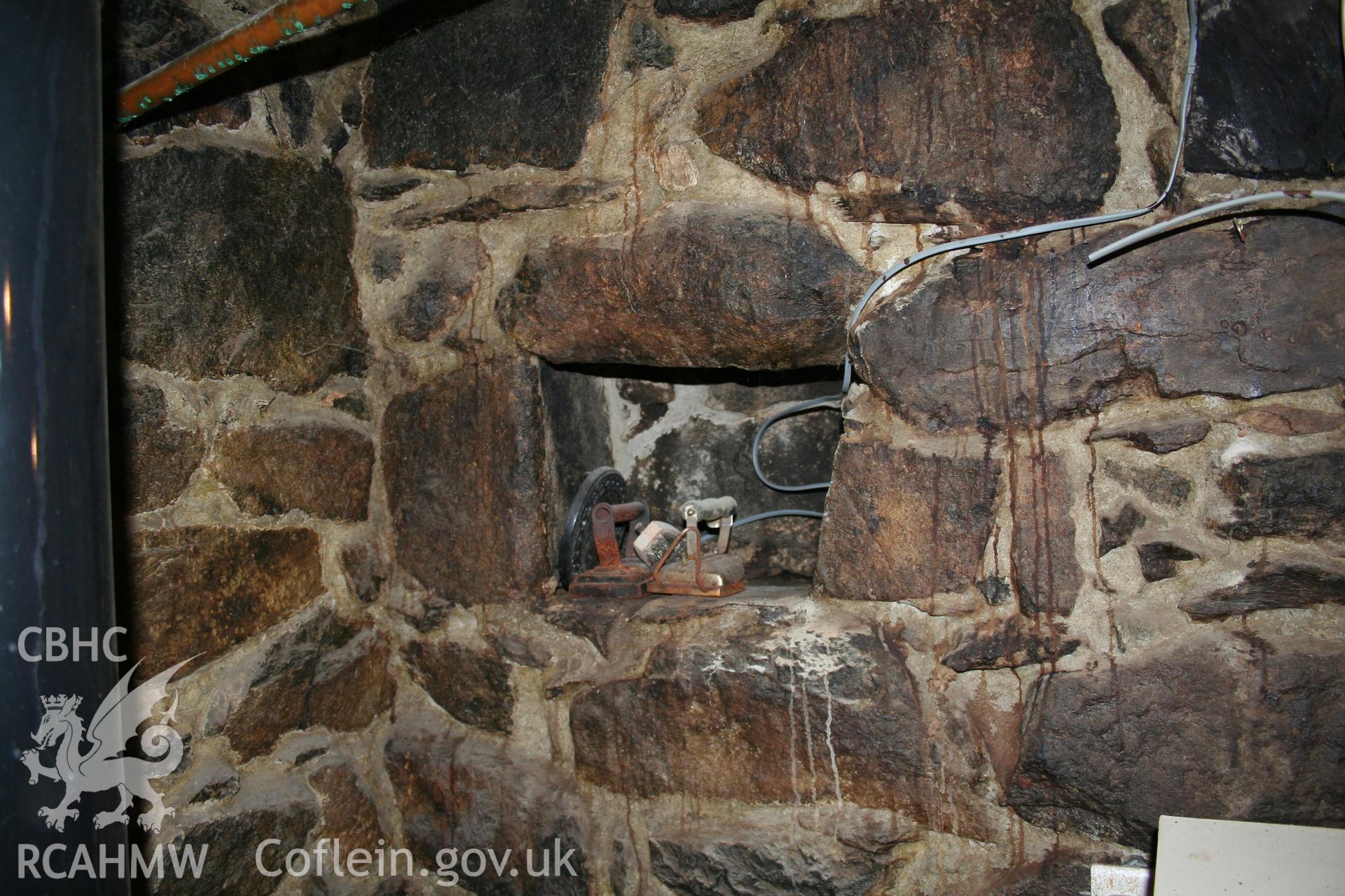 Interior: salt store, in fireplace.