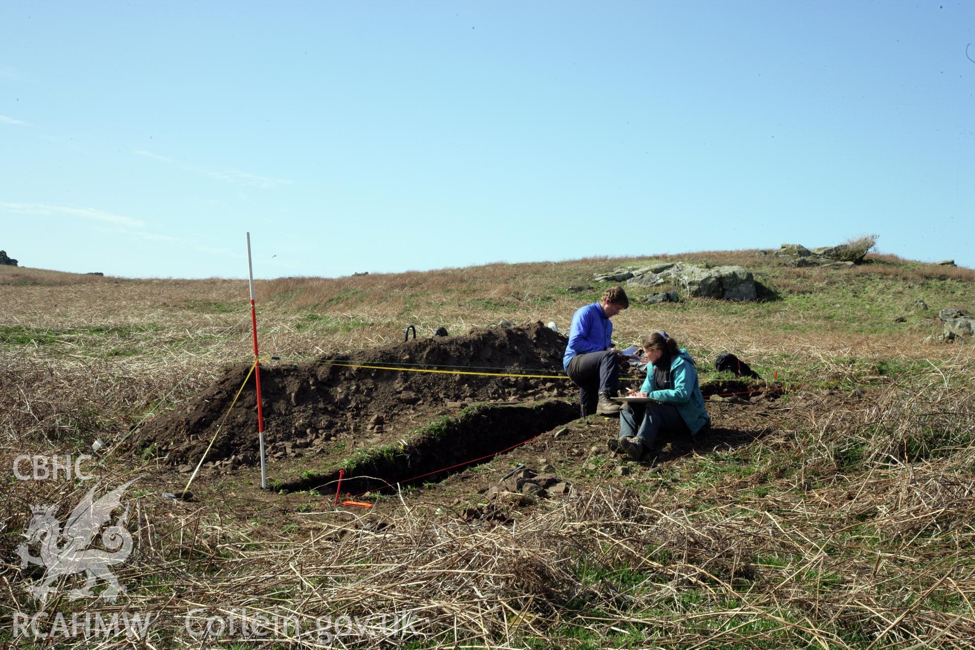 Skomer Island excavation of a burnt stone mound, Hut Group 8. Post excavation recording by B. Johnston and L. Barker
