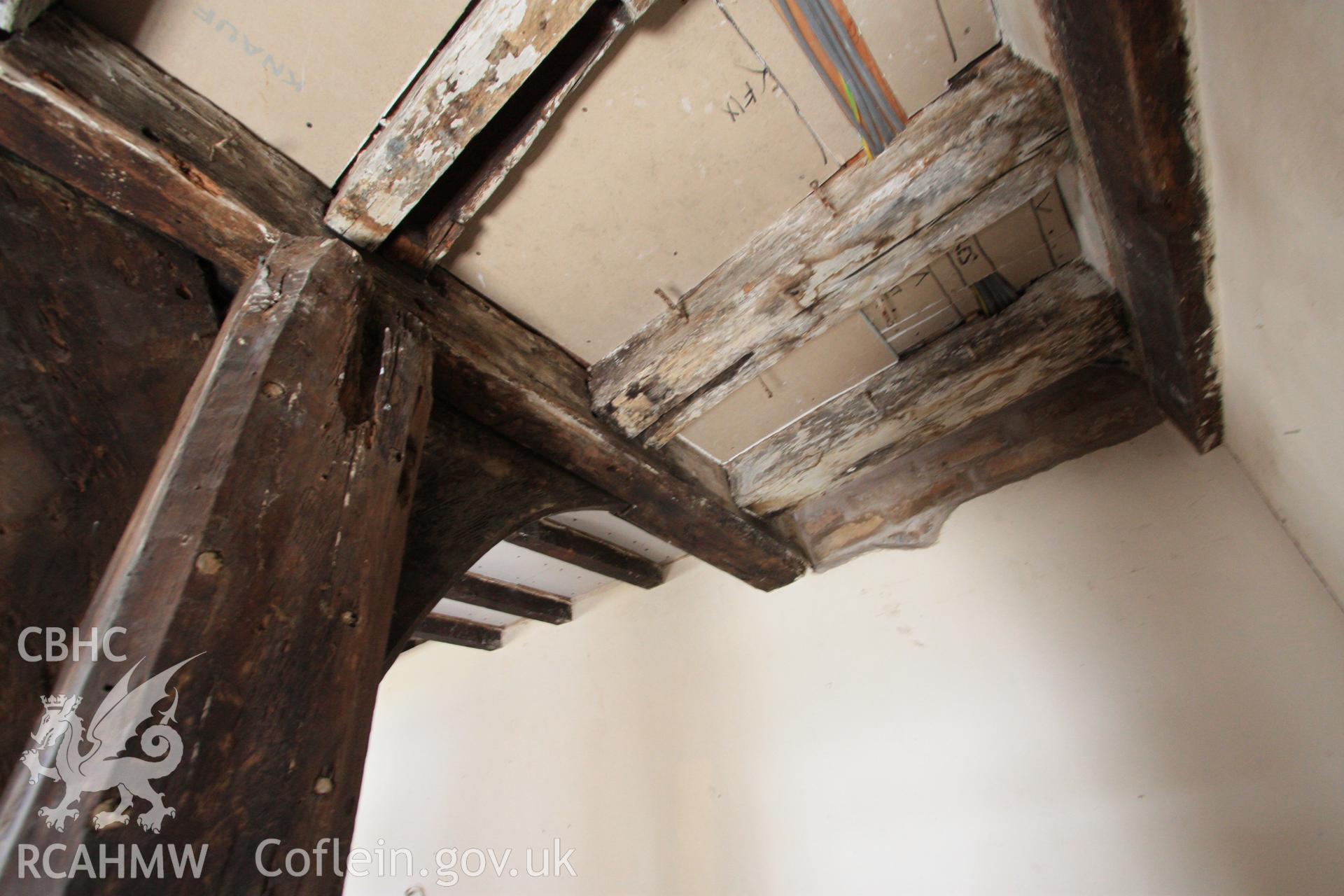 Interior: mortice for bracket and remaining original cantilevered dais joist.