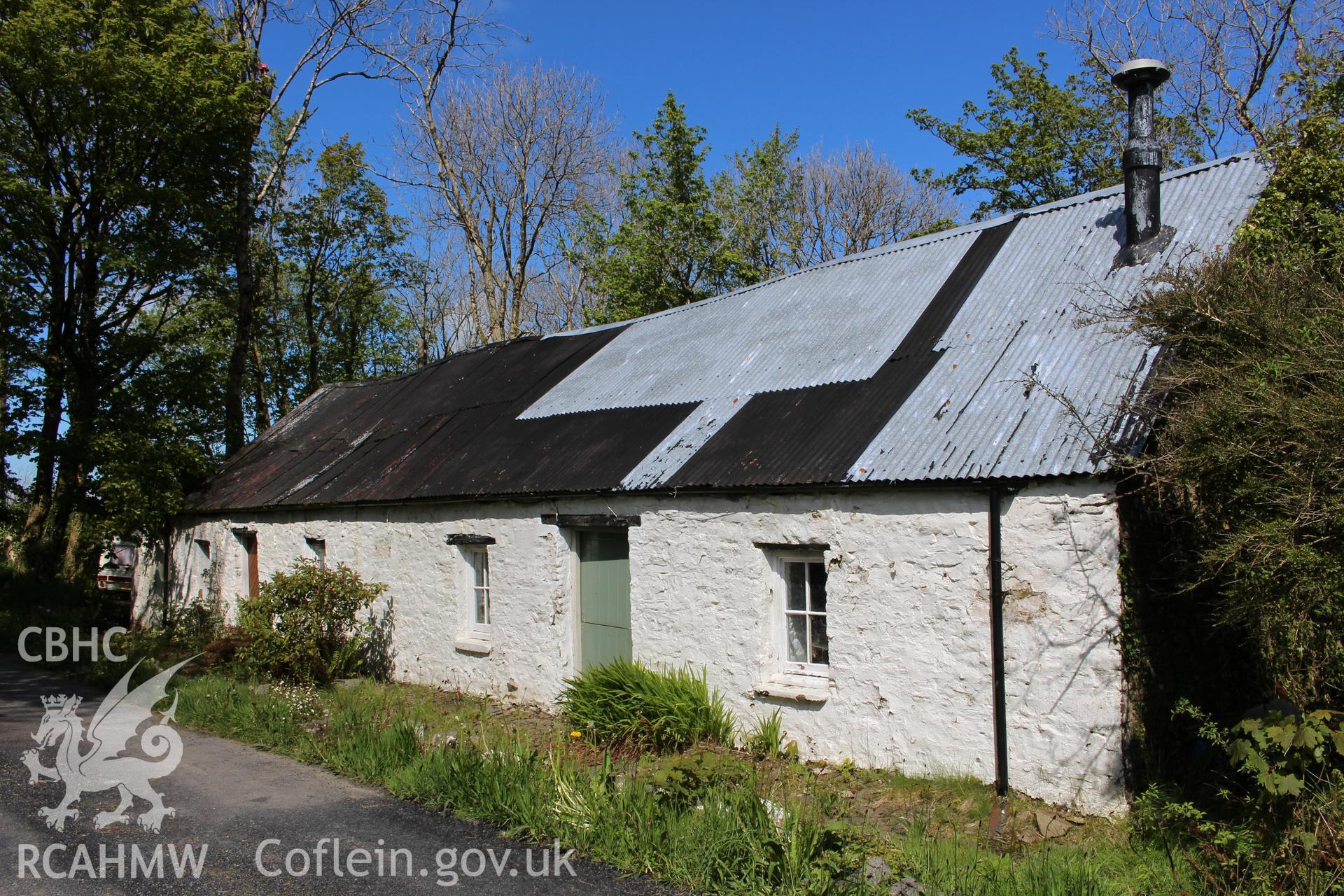 Exterior: west elevation, viewed from south.