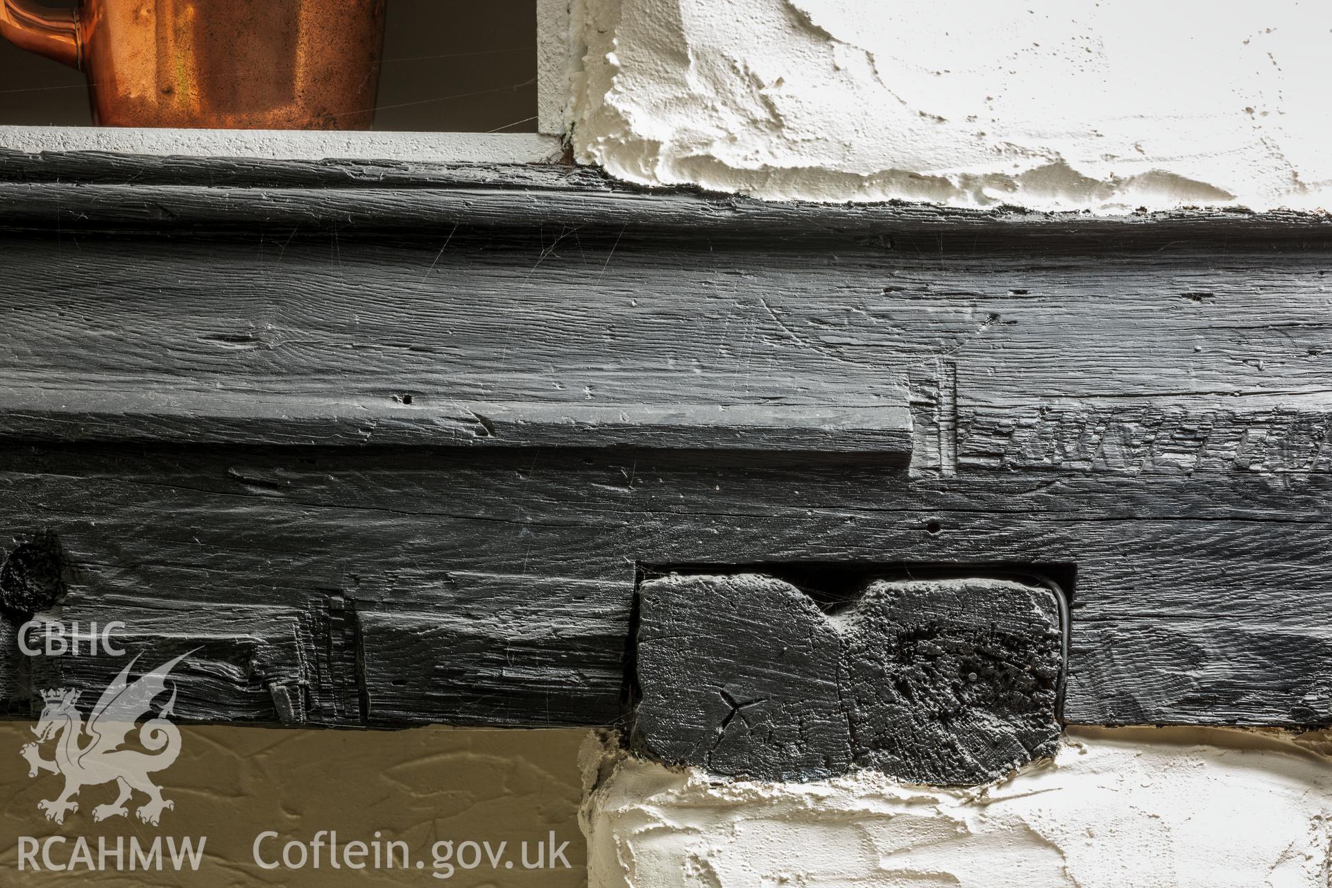 Detail of carving on fireplace bressumer