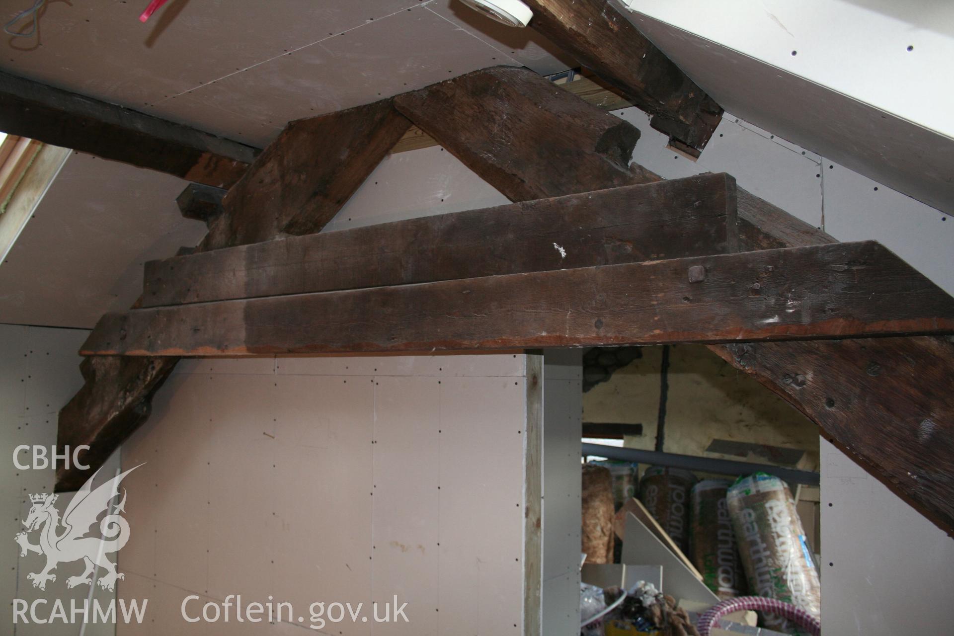 Interior: truss above parlour, with 19th century collars.