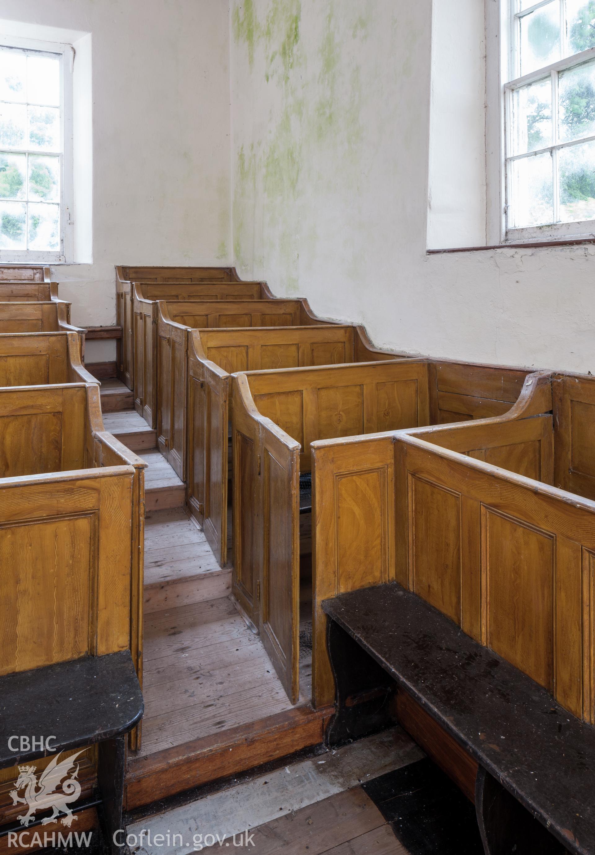 Detail of box pews on north wall