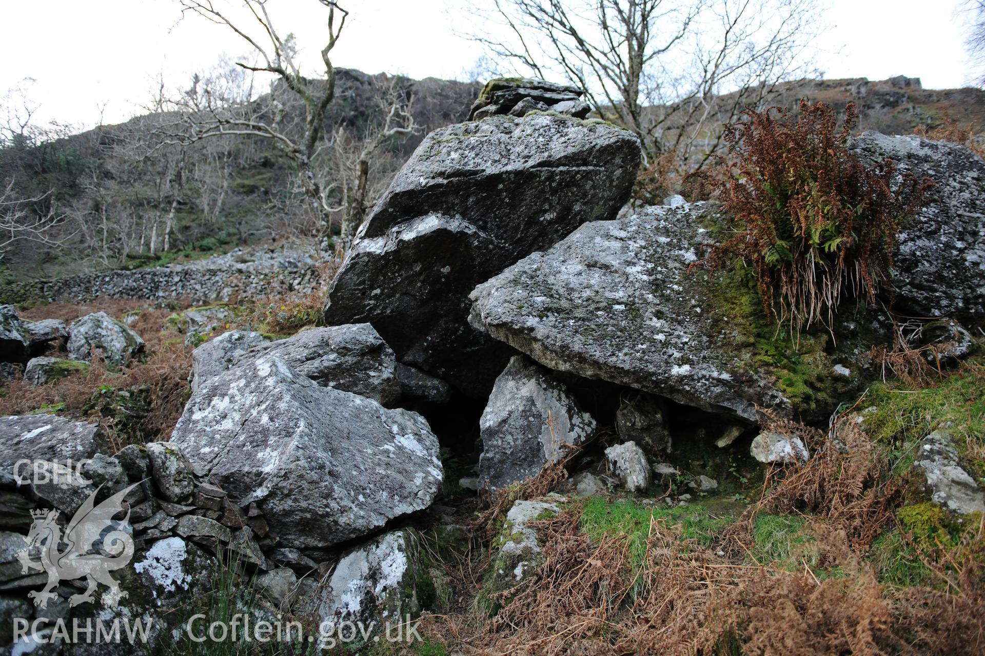 Photo survey of find spot of Tal-y-llyn hoard, beneath naturally-propped boulder alongside path. General view of find spot