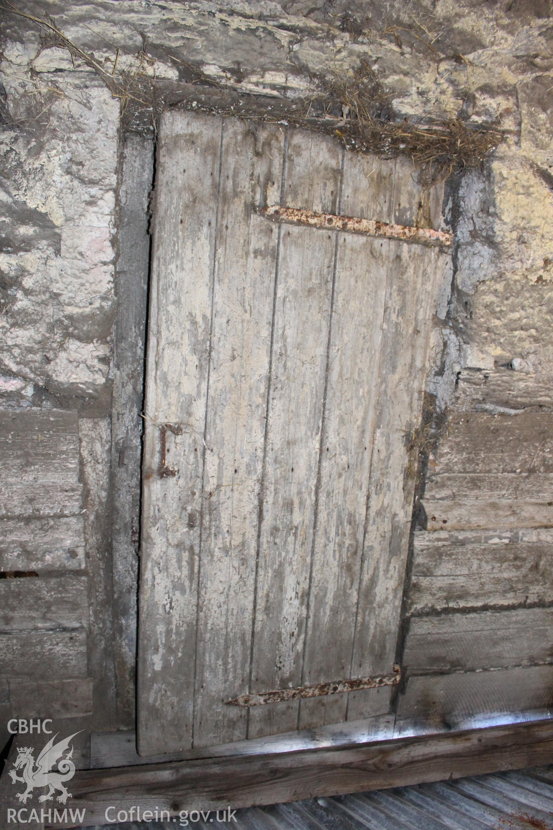 Interior; door into barn from later rear extension.