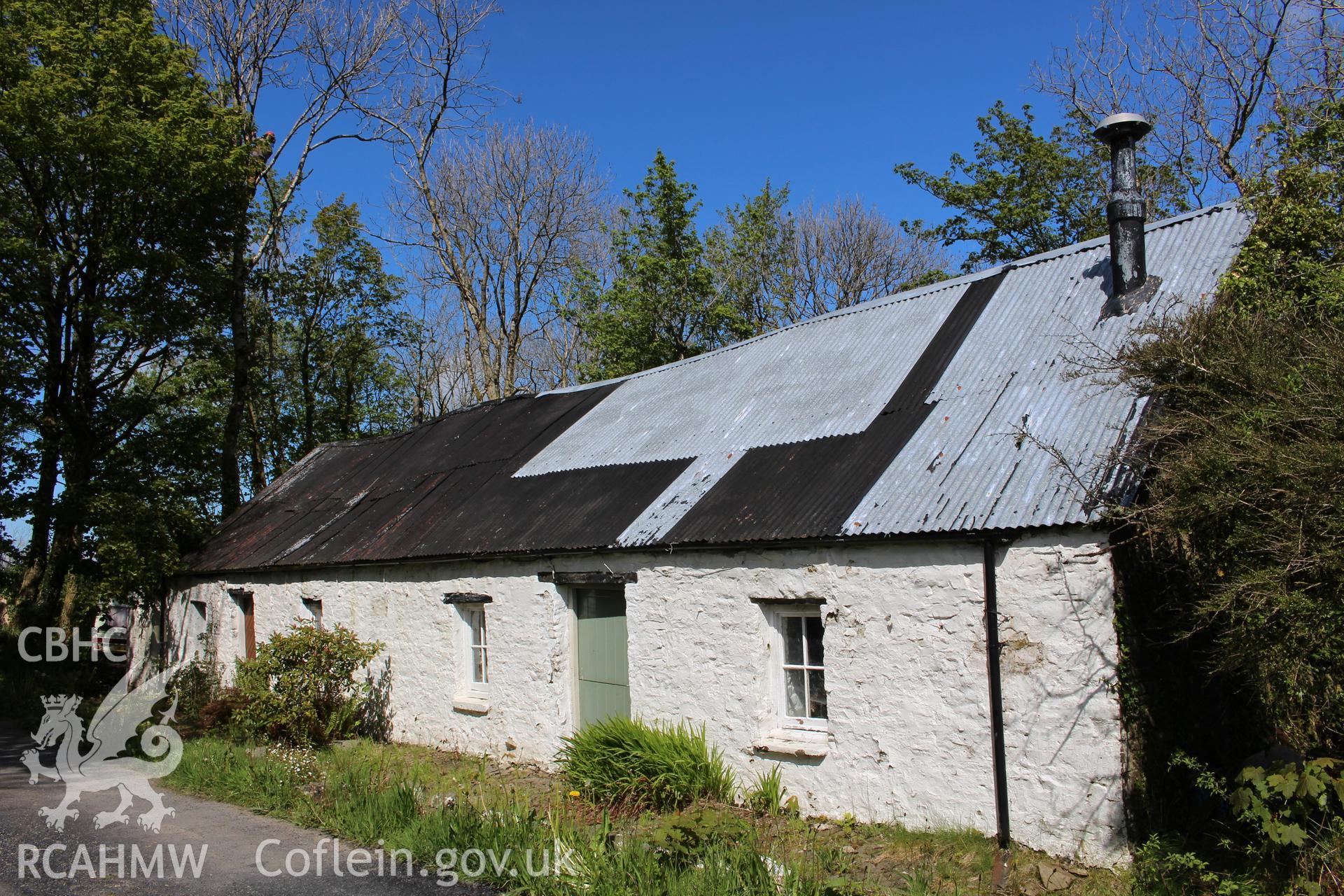 Exterior: west elevation, viewed from south.
