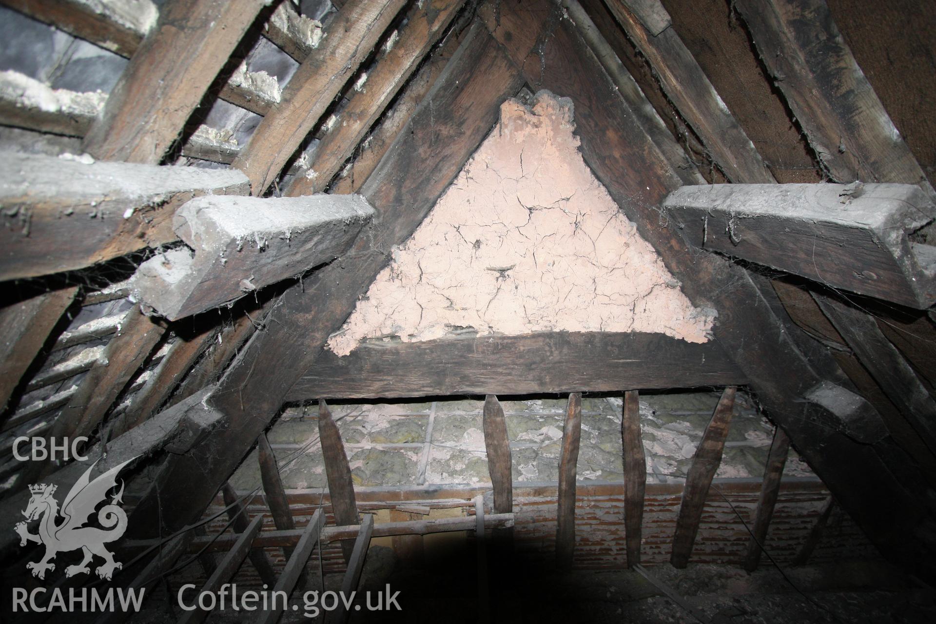 Hall's tie-beam and arch-braced collar truss at dais, view from cross-wing.