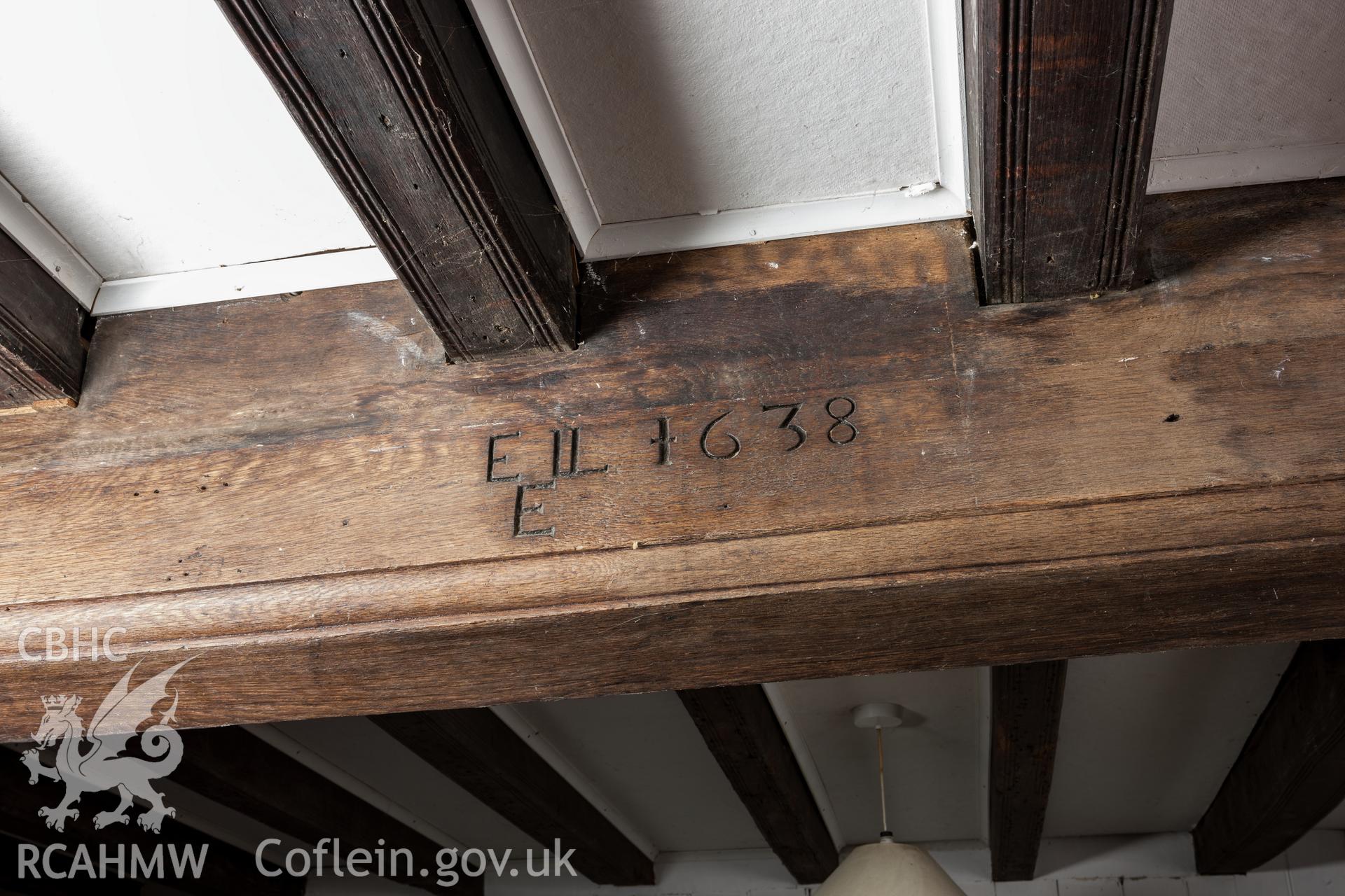 Date inscription and joist decoration in parlour