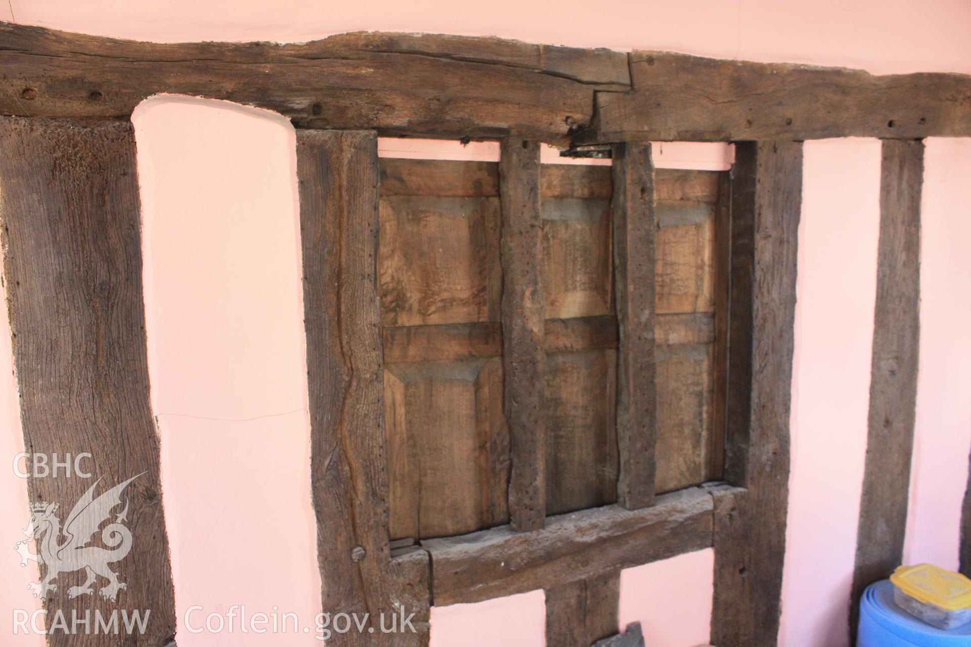 Interior: remaining diamond set mullion window, also surviving are the studs.