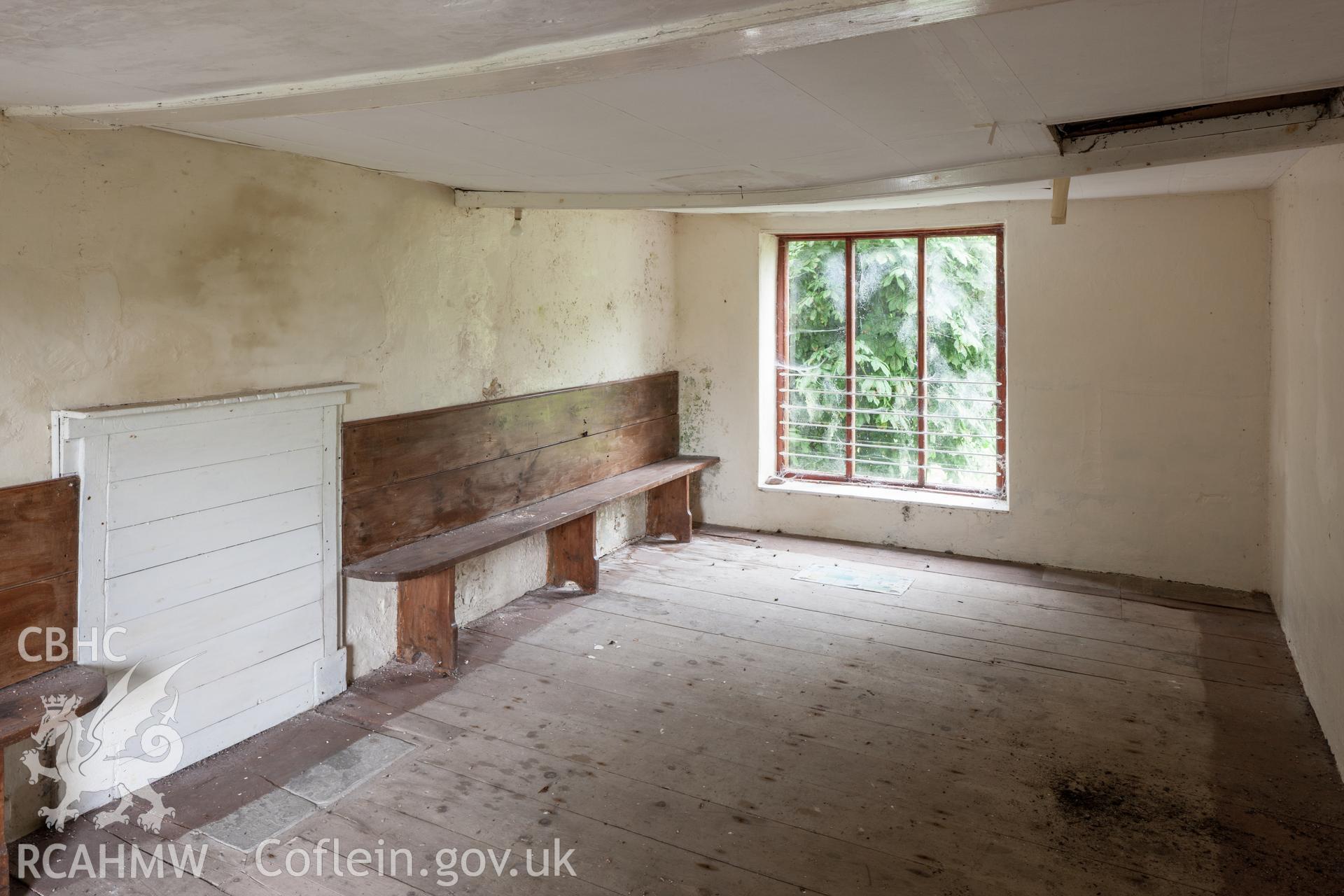 Interior of upstairs school room, looking southwest