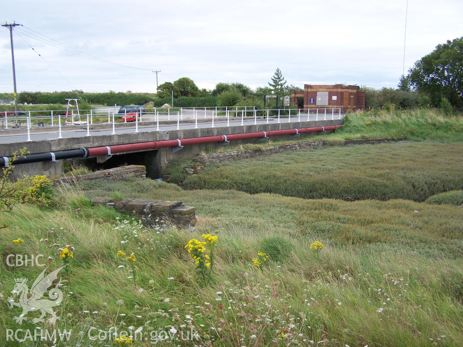 Remains of sluicegate  with stone retaining wall/dam