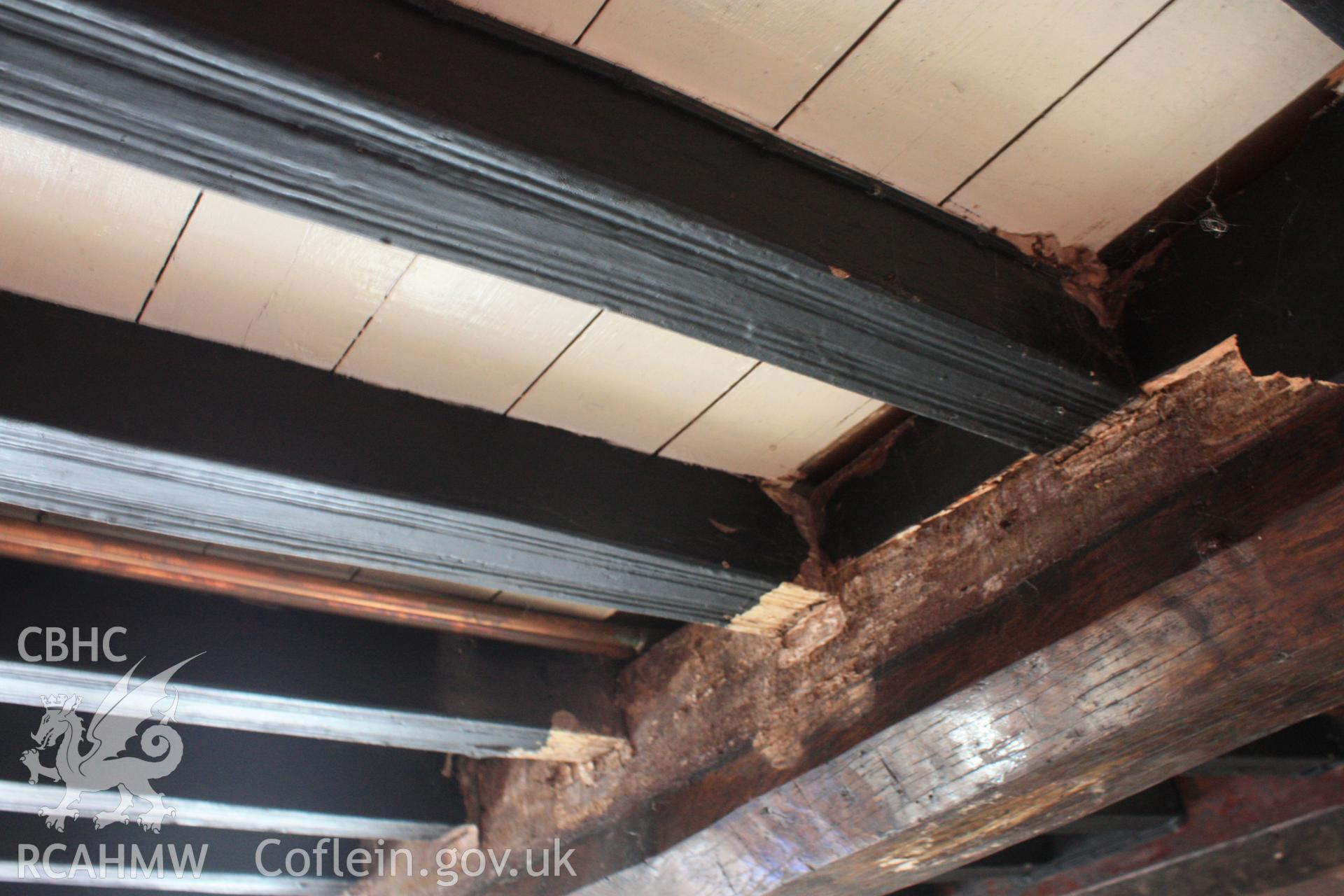 Interior; reed mouled joists and deep chamfered floor beam.