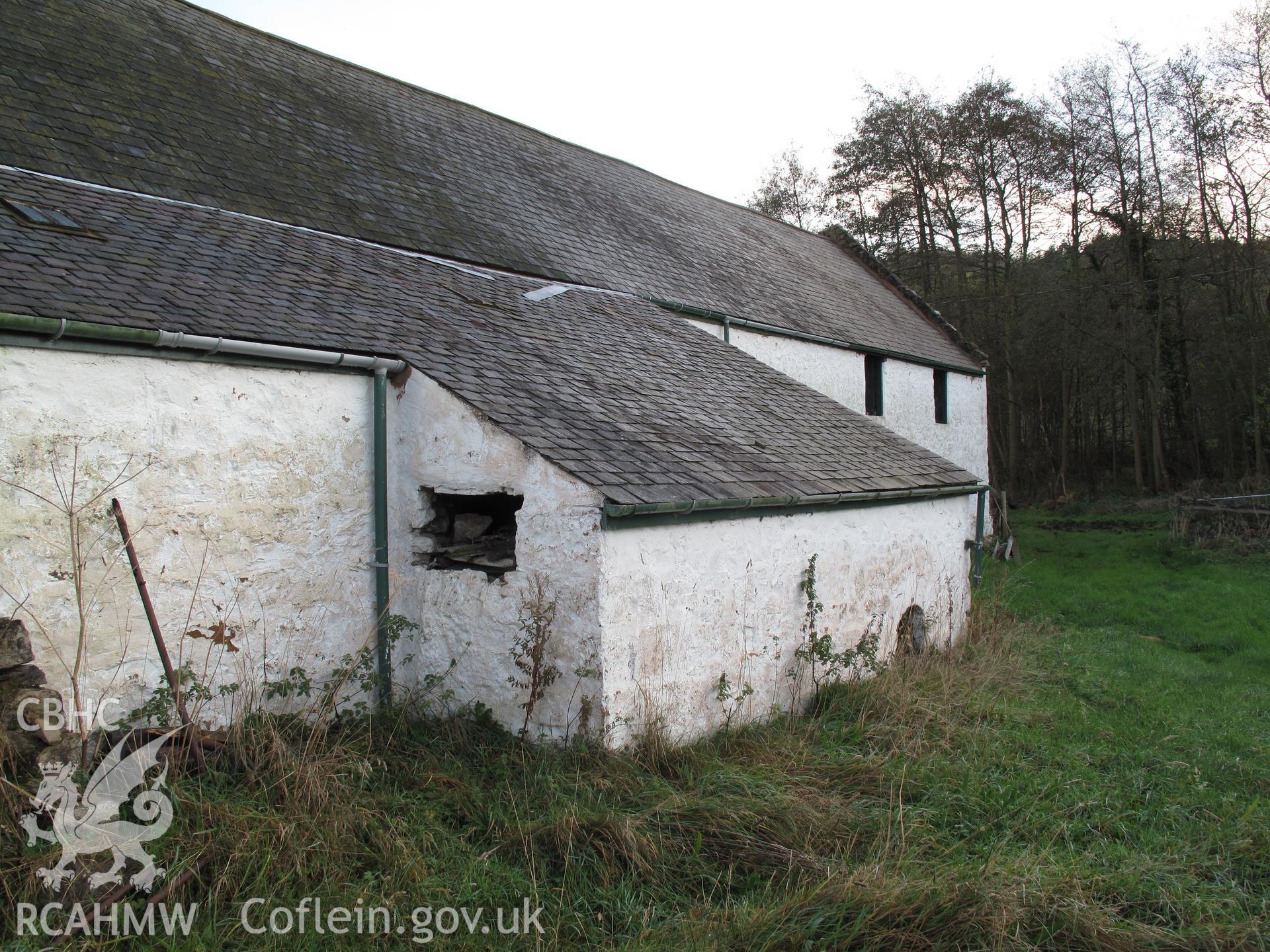 View from the northwest of Maes-y-coed Farm outbuilding showing the waterwheel house and opening for launder.