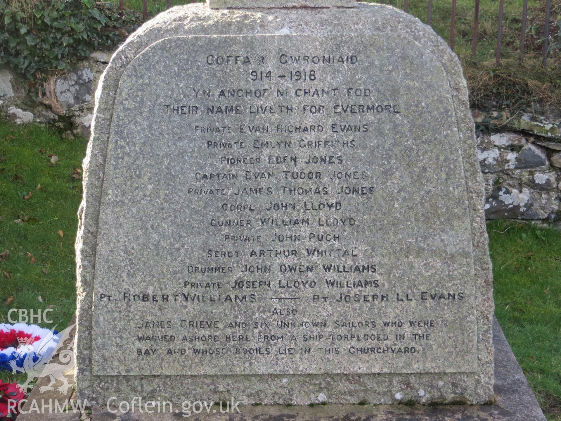 Inscribed front face of plinth.
