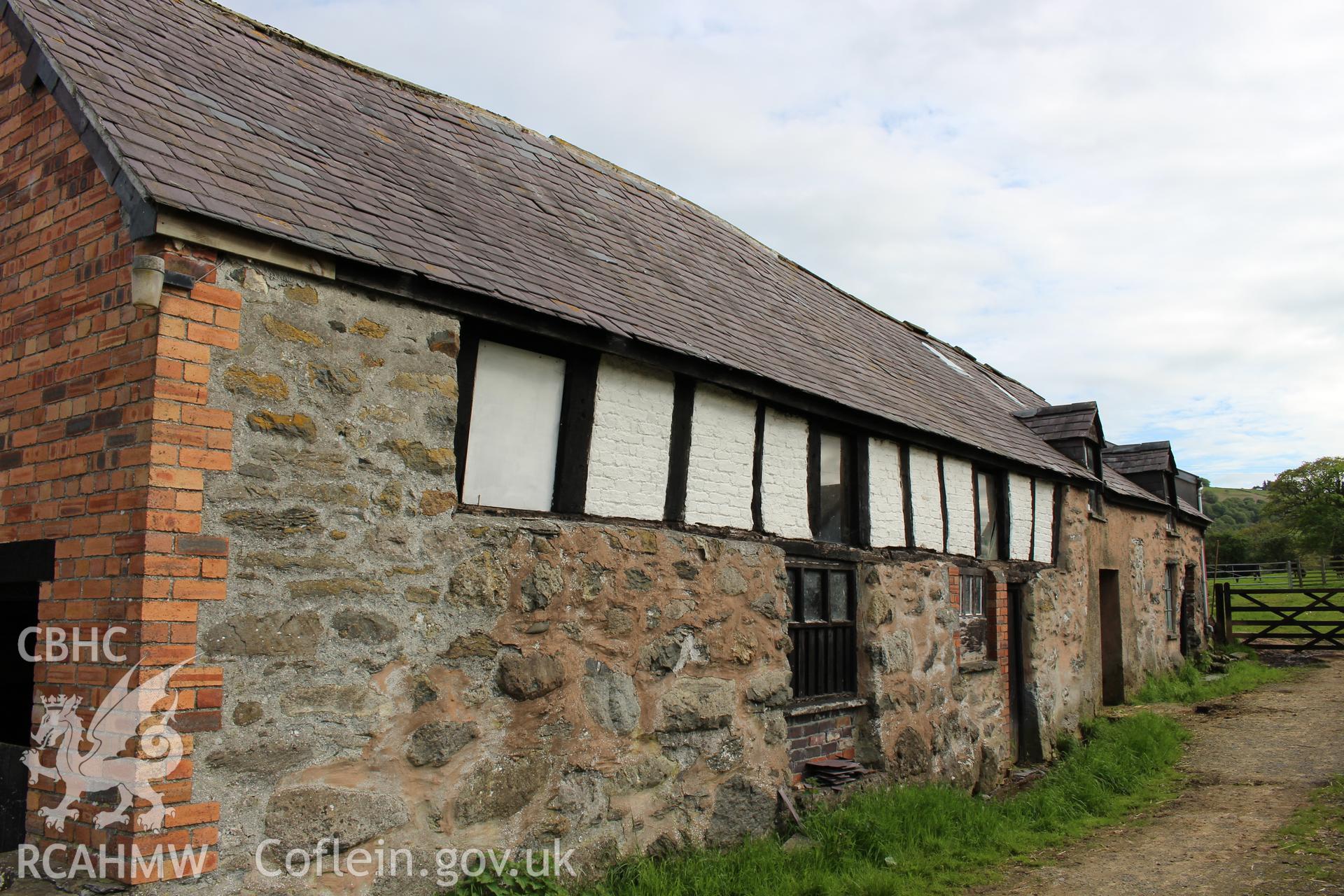 Exterior; View along west elevation from north, showing both barn and house