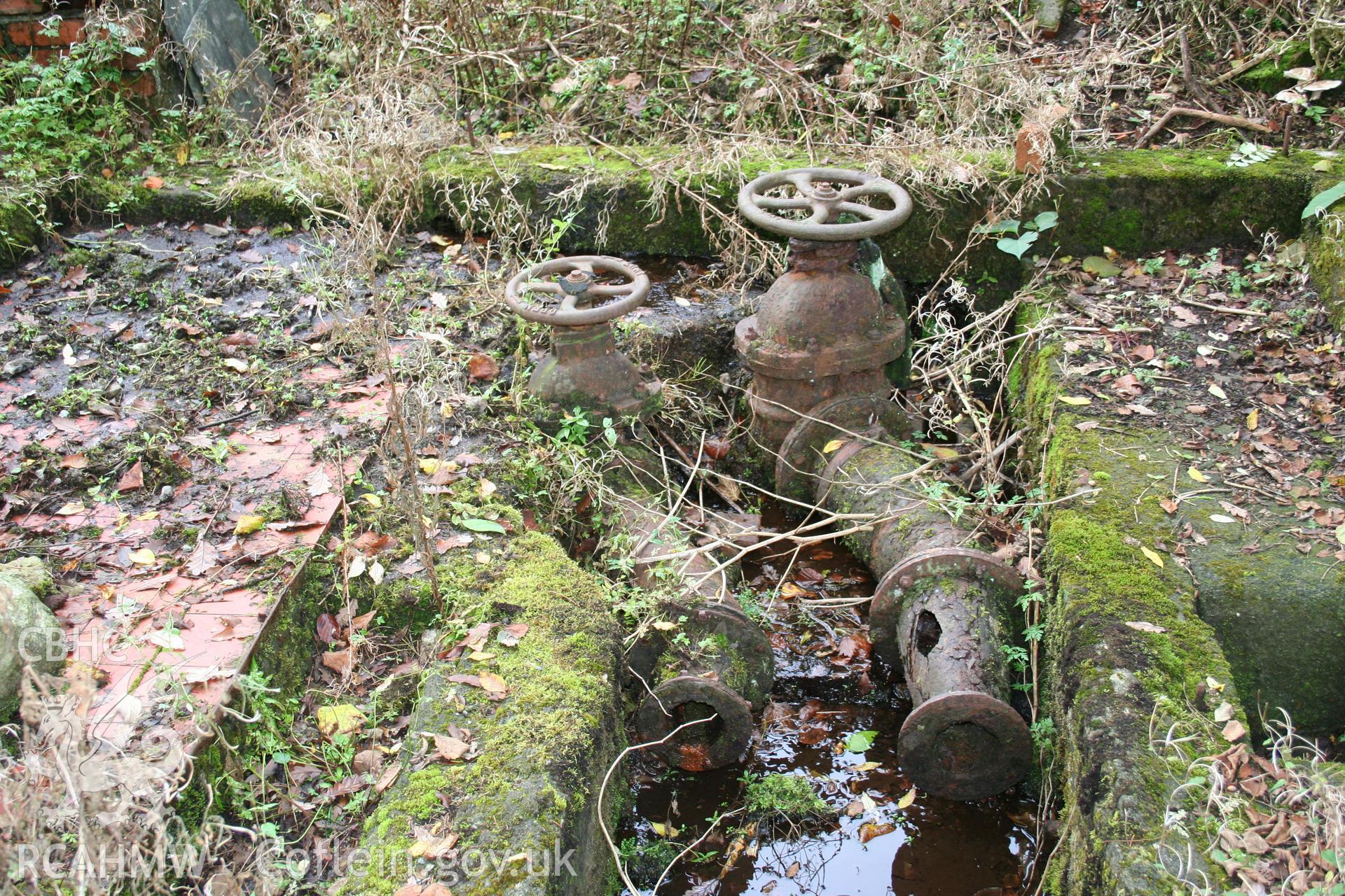 Detail of valves in the base of the turbine house, Hufenfa Meirion Milk Depot.