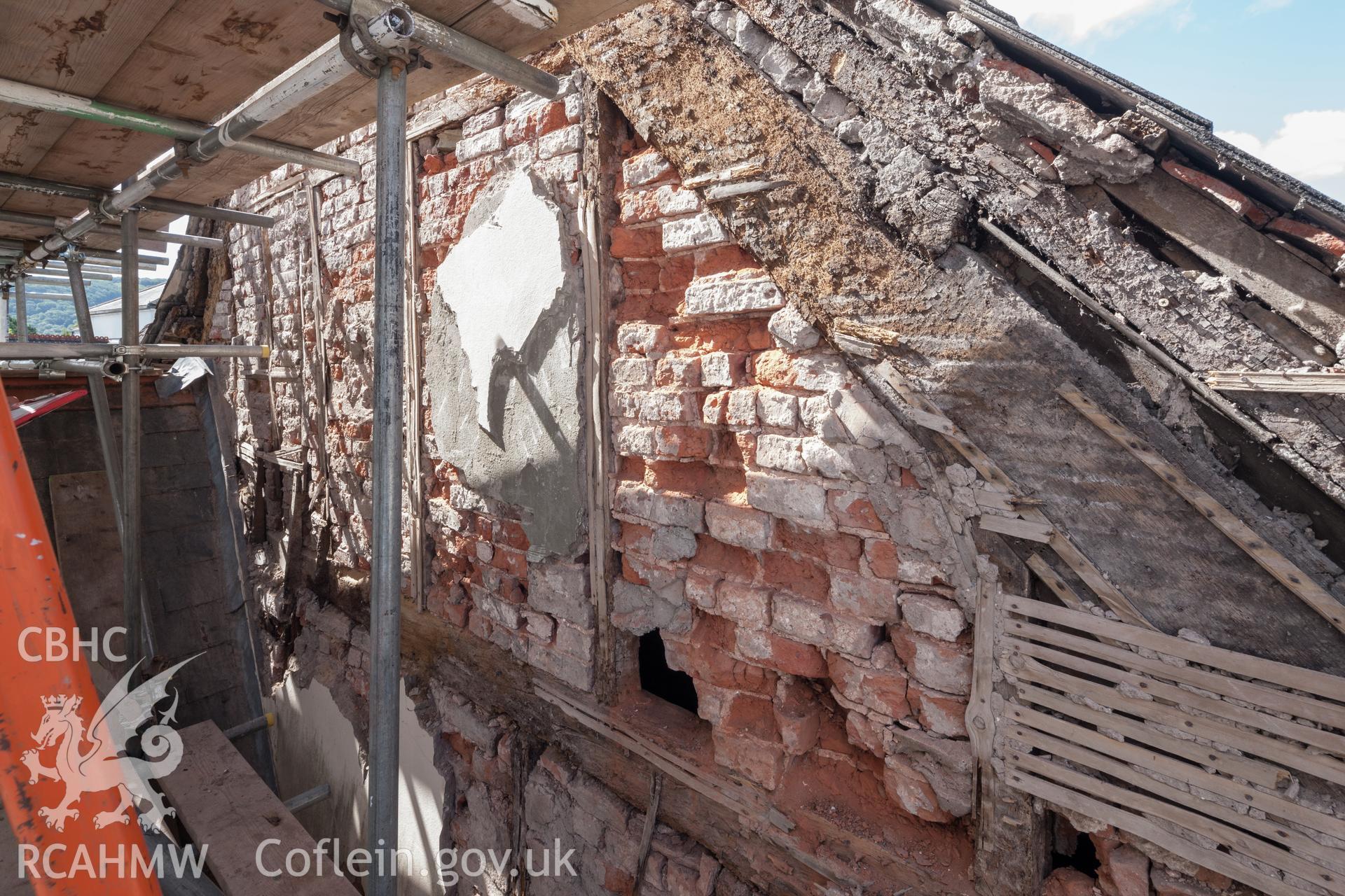Framing of gable wall at eaves level, viewed from the north northwest