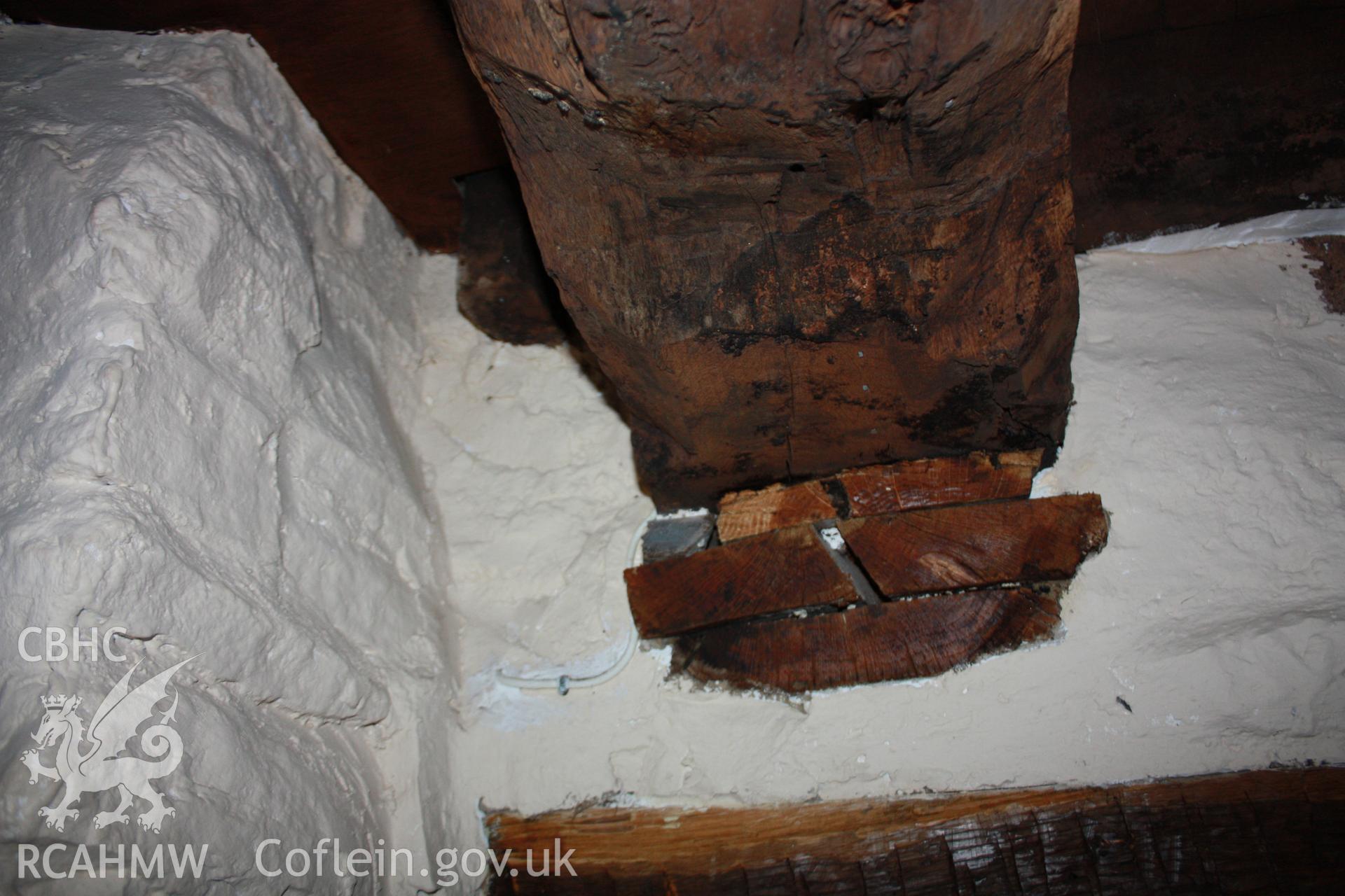 Parlour/living-room ceiling-beam in recess to right of fireplace.