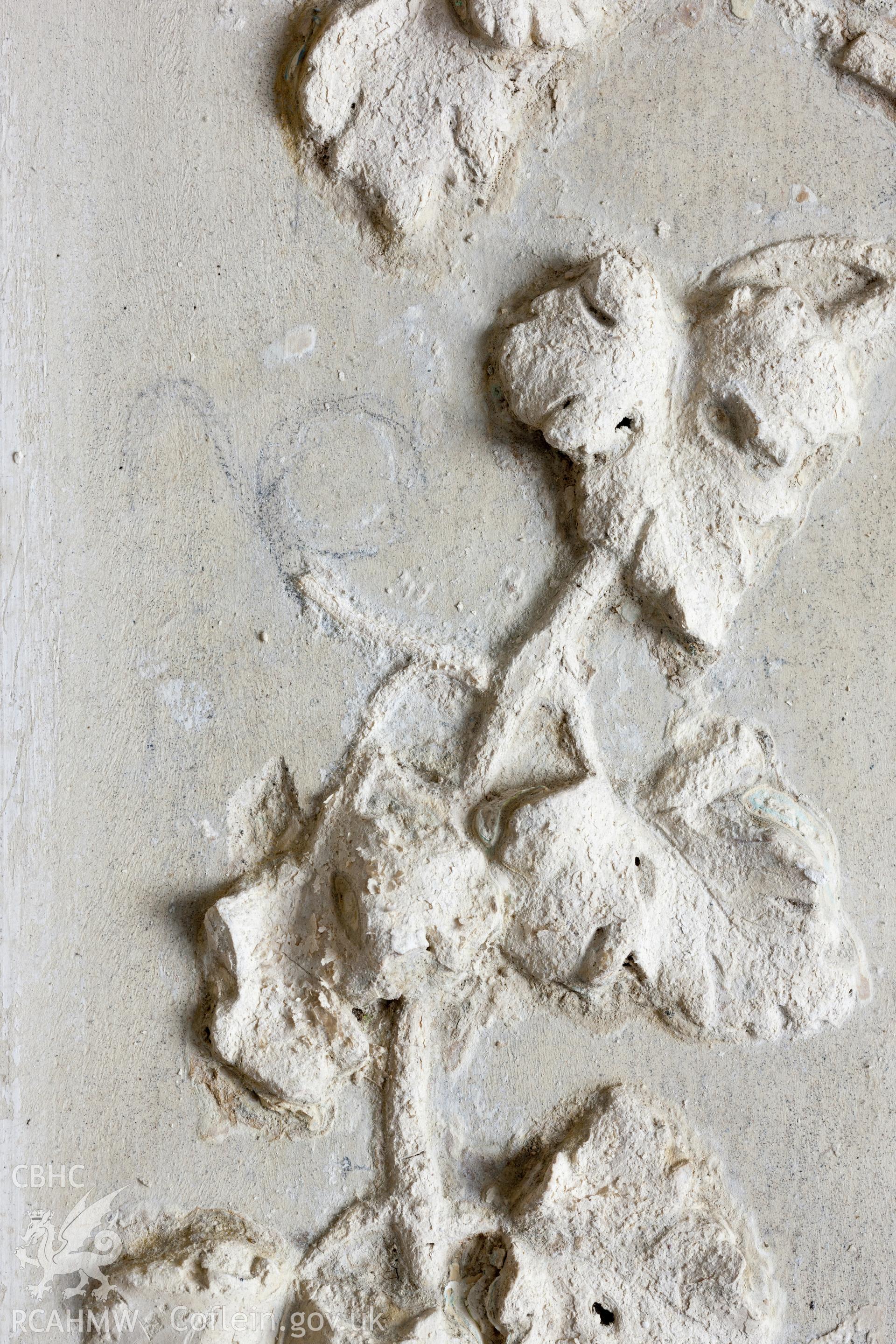 Interior of decorated plaster room, detail of plaster on northwest wall showing pencil layout