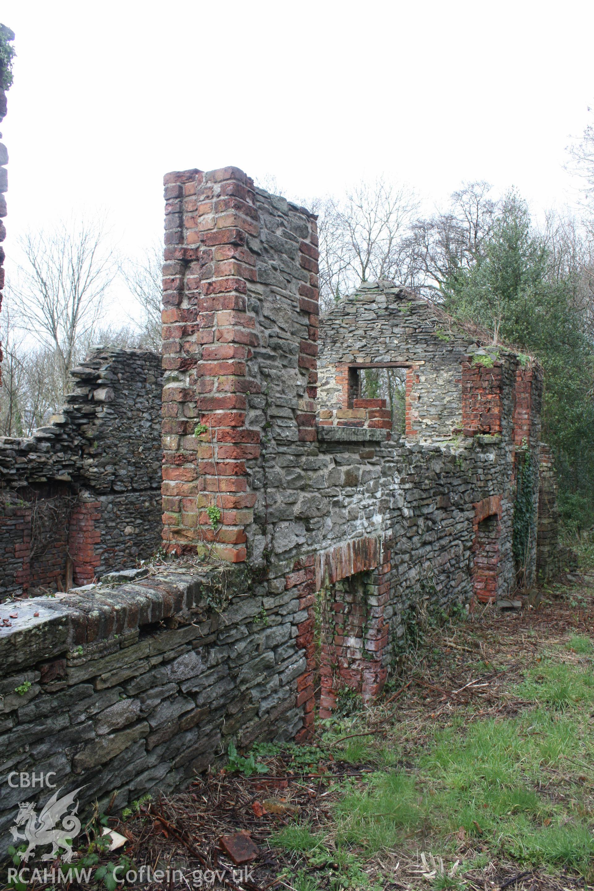 Large workshop at north end of site from south-east