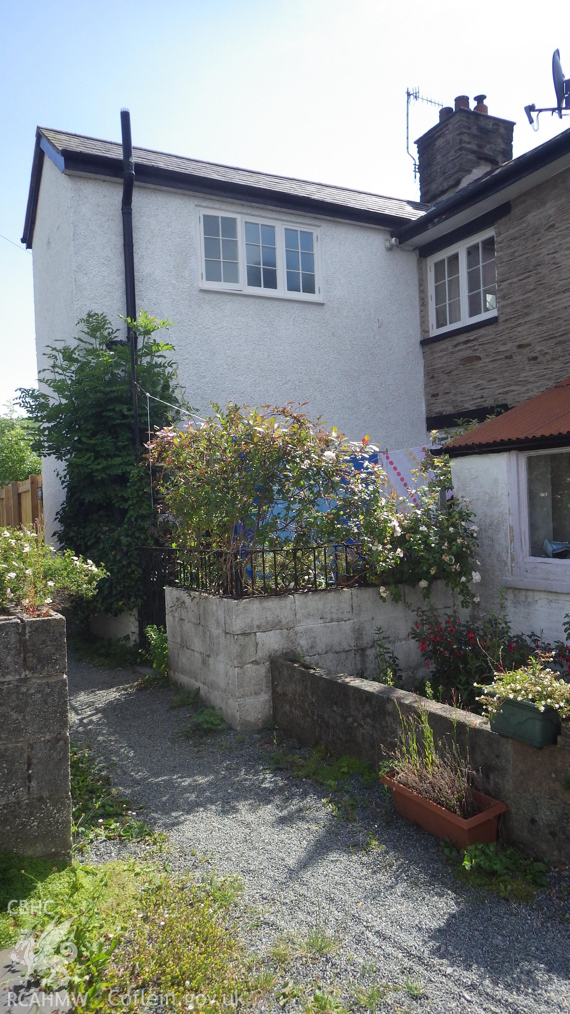 Cross extension to rear of chapel