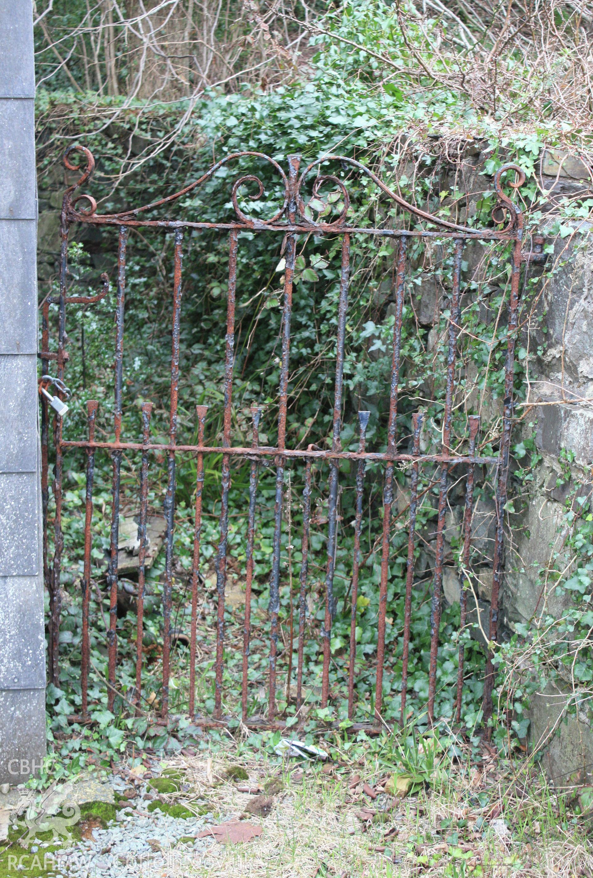 Detail of cast iron gate at south end of building
