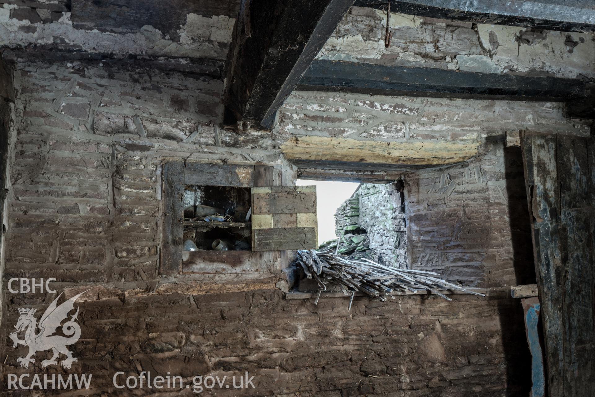 Hall, detail of partially blocked window in east wall