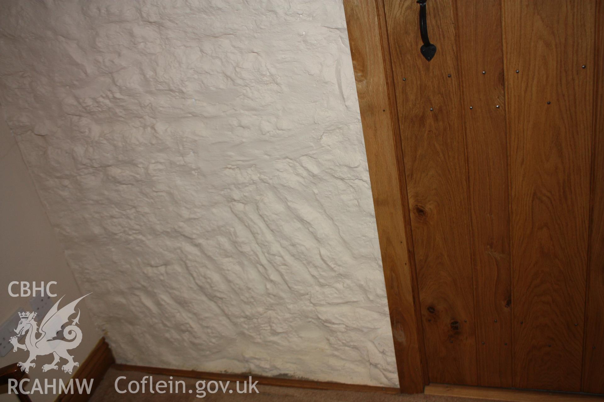 Foundation arch under cross-wing first-floor doorway.