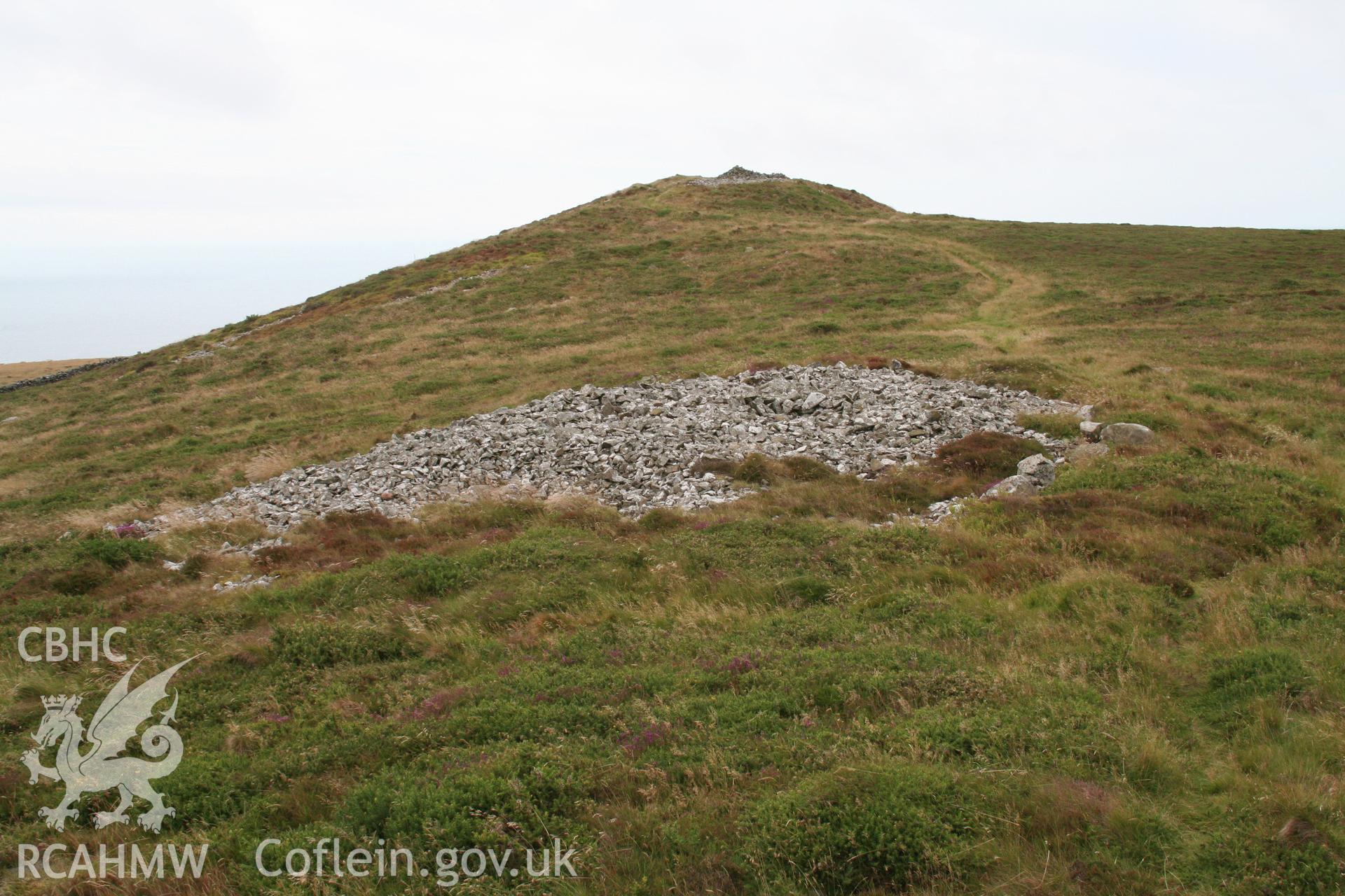 Cairn III, Mynydd Rhiw from the north.  In the middle distance is Cairn NPRN 302262.