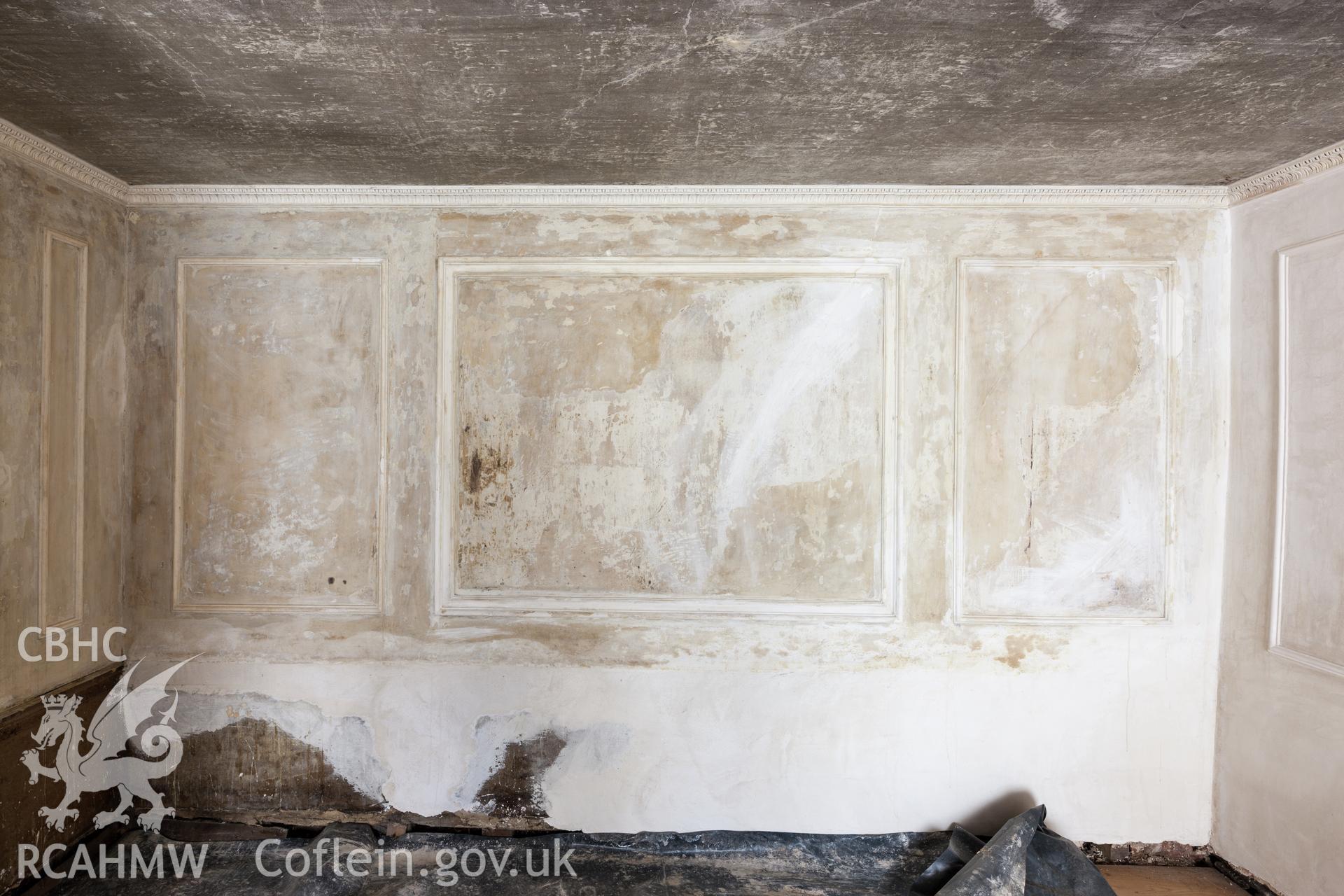 Interior of decorated plaster room, detail looking southwest