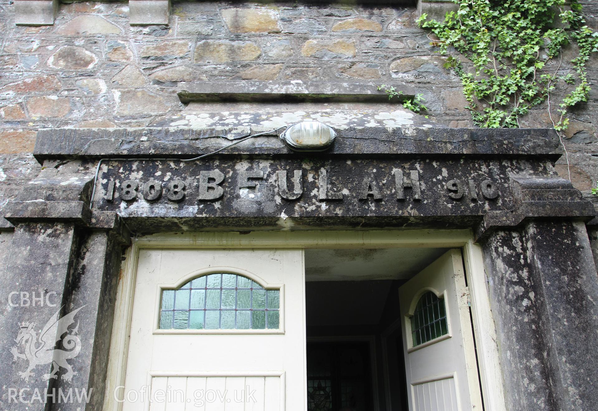 Detail of name above facade door