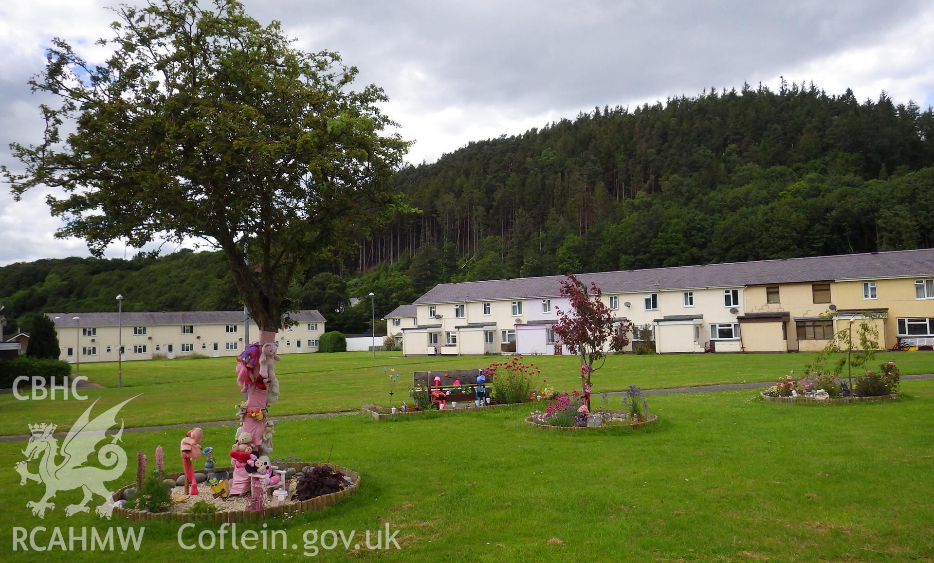Flowers beds created on the play area frequently used by April Jones