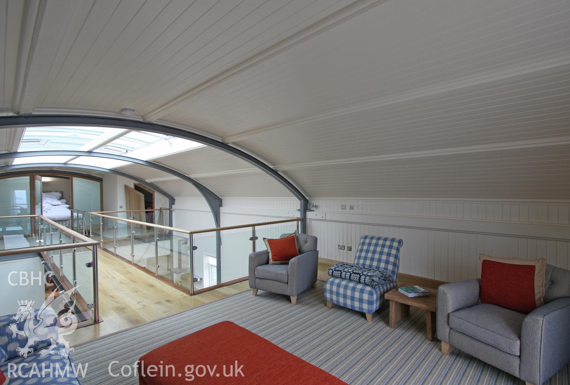 First floor interior of converted lifeboat station looking west