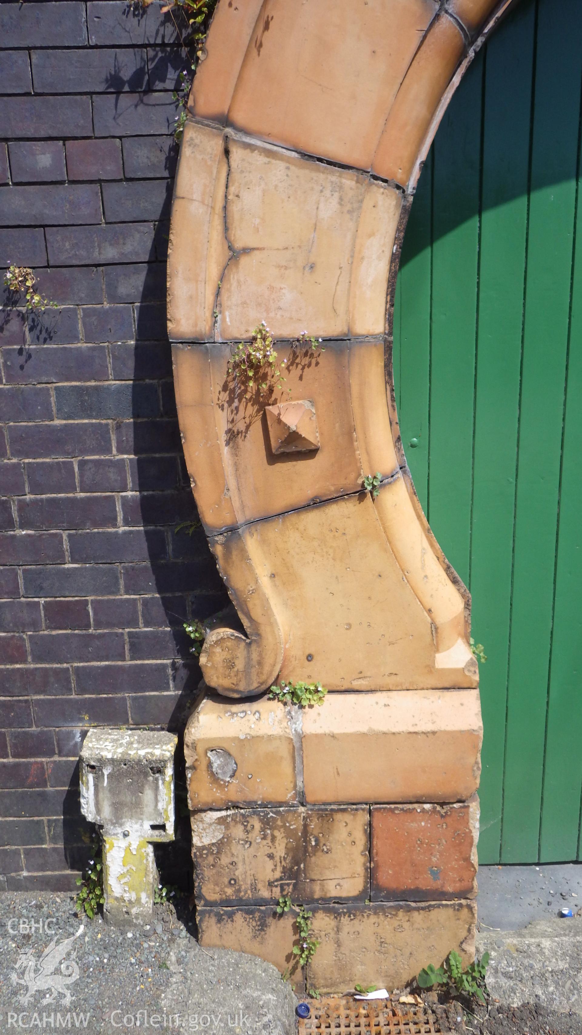 Detail of northern butress of arched entrance to Smithy
