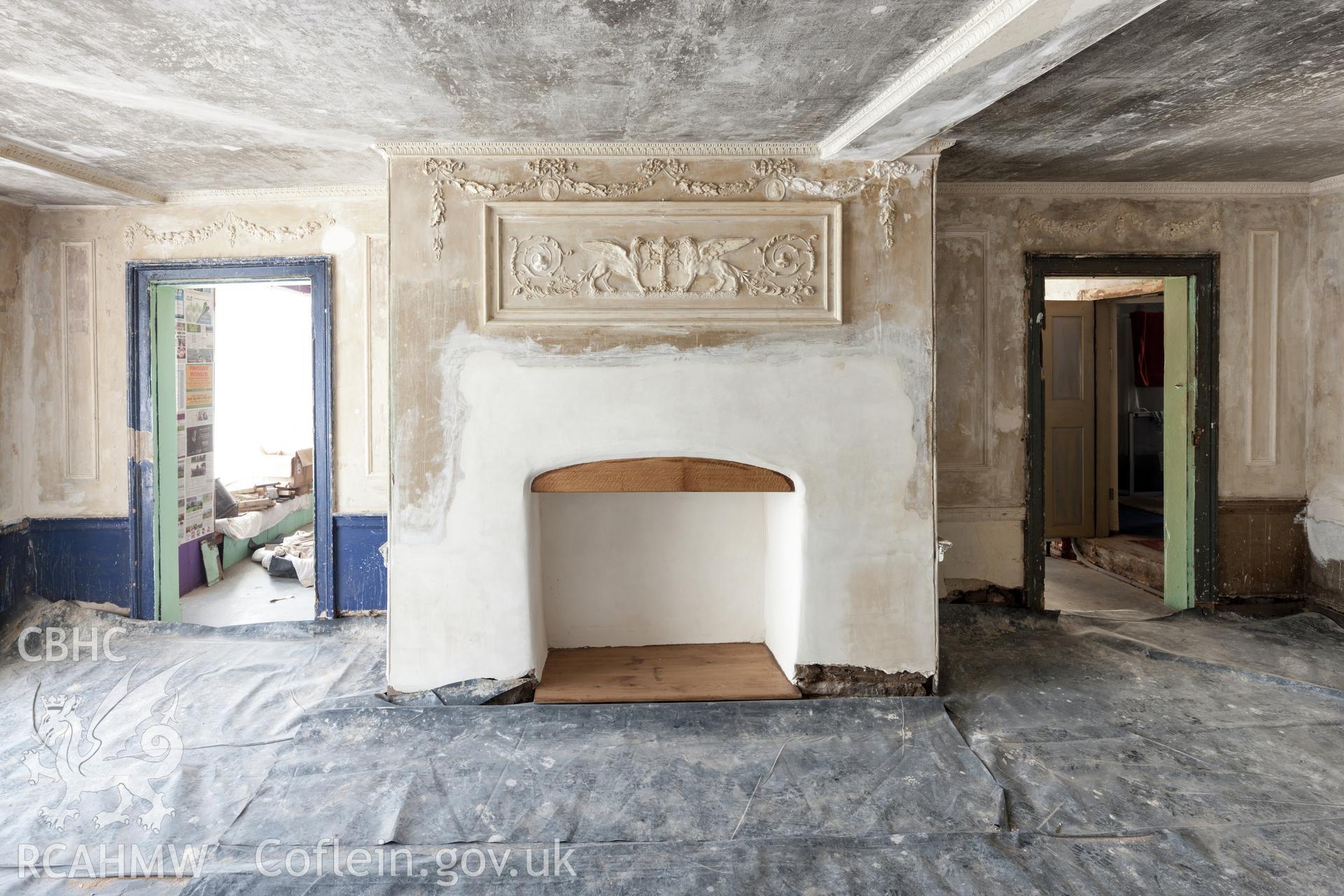 Interior of decorated plaster room, looking southeast