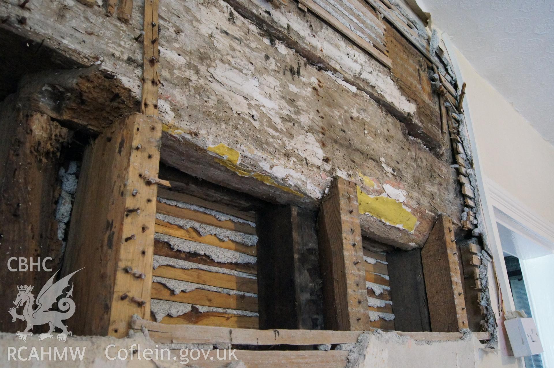 Original partition with soffit groove for former post & panel in front parlour.