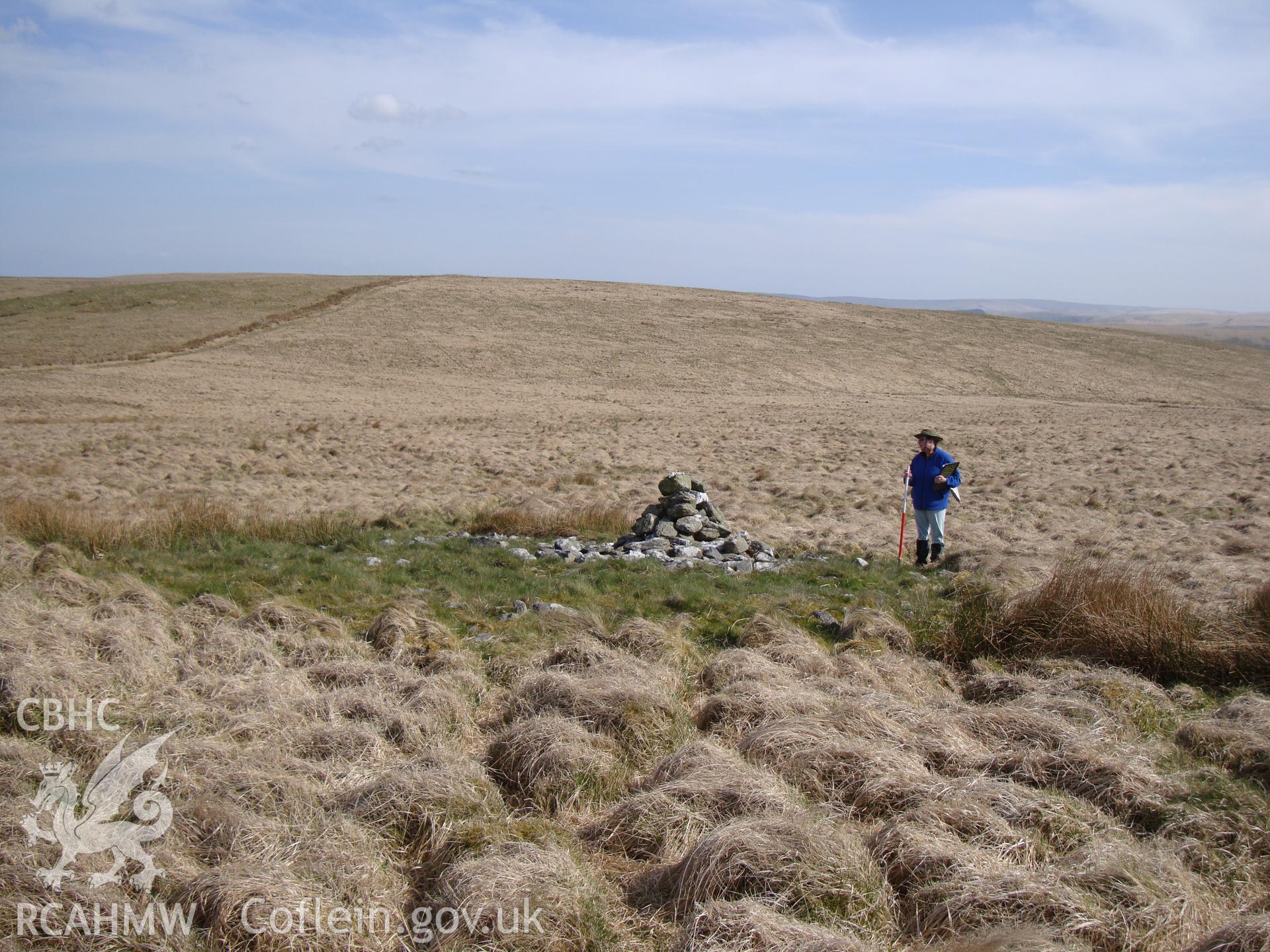 Marker cairn, on top of earlier cairn, NPRN 502550, looking south southeast.