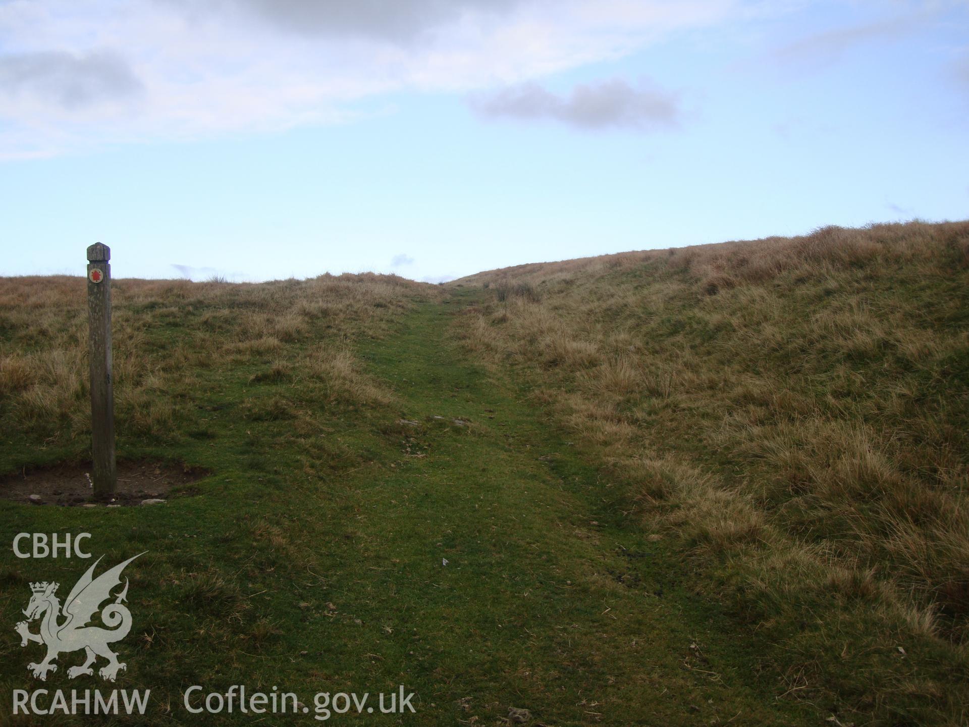 Trackway at SN8297168543, grass-covered, looking east northeast.