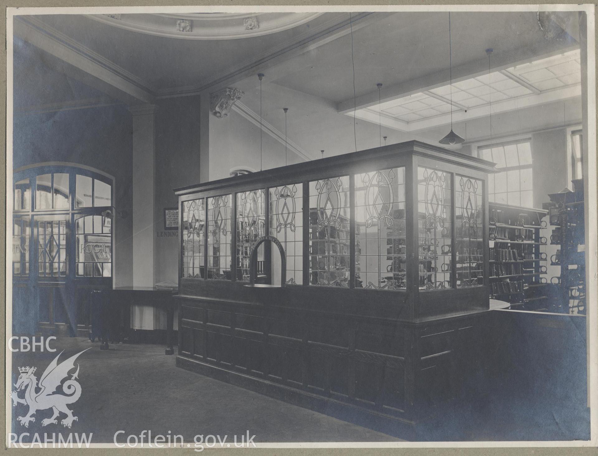 Black and white photograph showing part of the interior of Cathays Public Library, Cardiff.