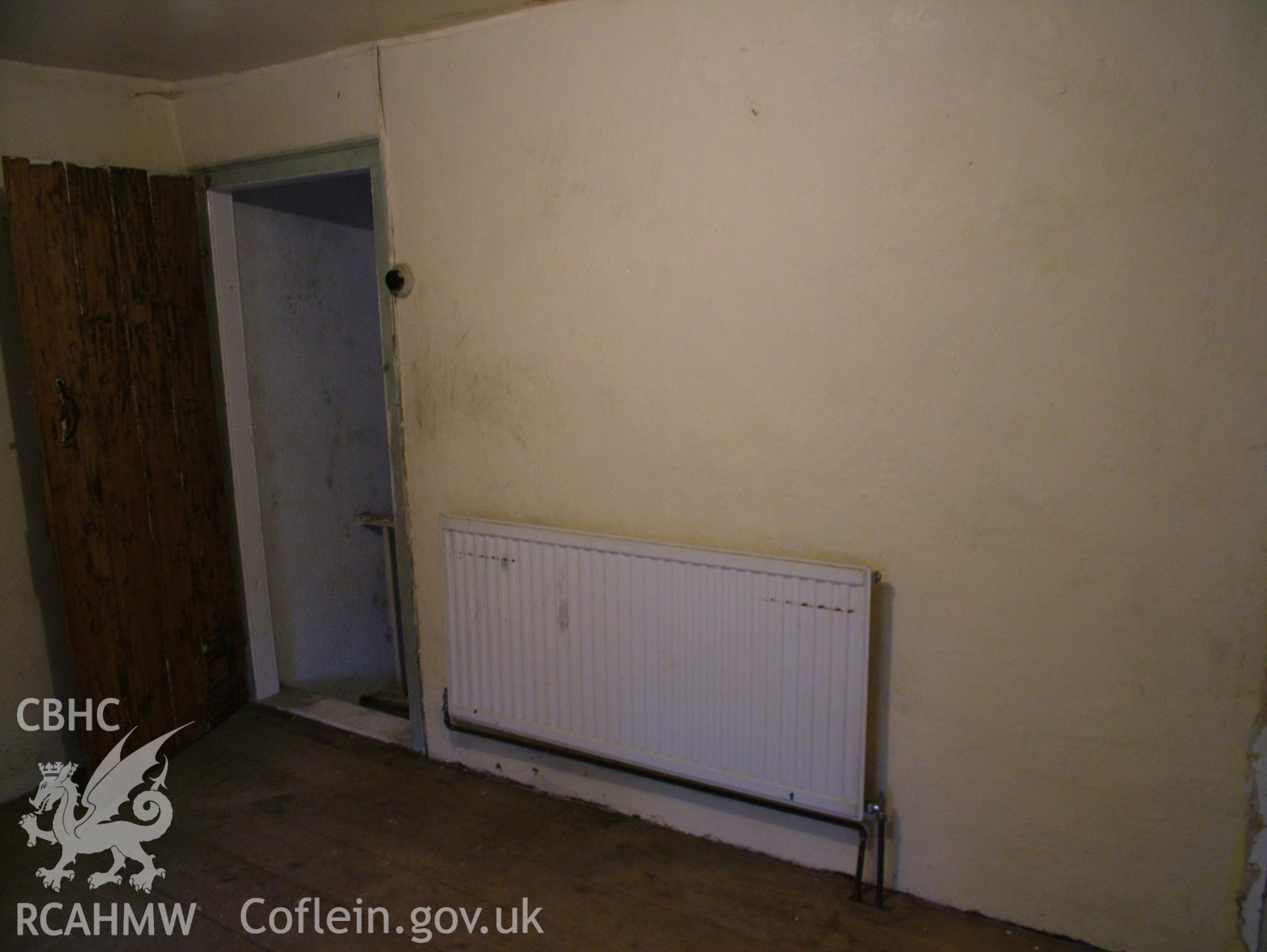 Digital colour photograph showing Llwynypandy chapel house - interior, view of bedroom