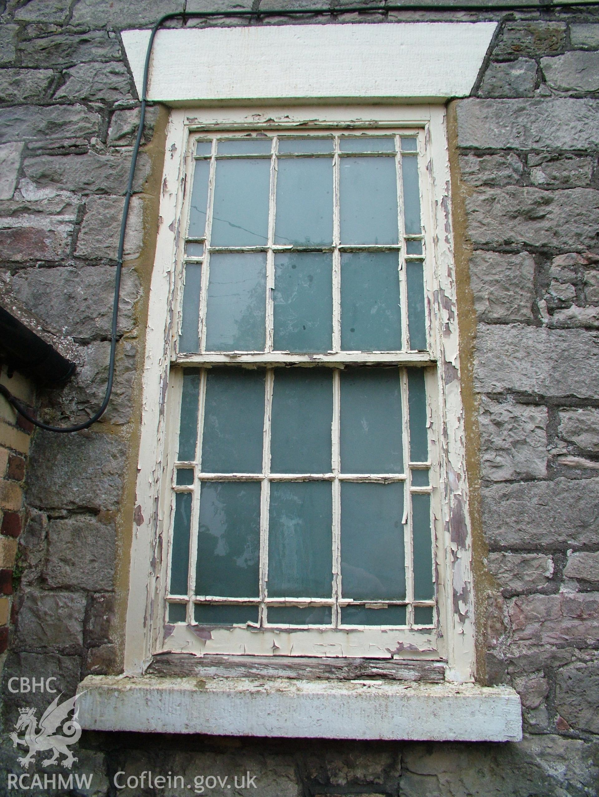 Digital colour photograph showing Llwynypandy chapel - exterior view showing window