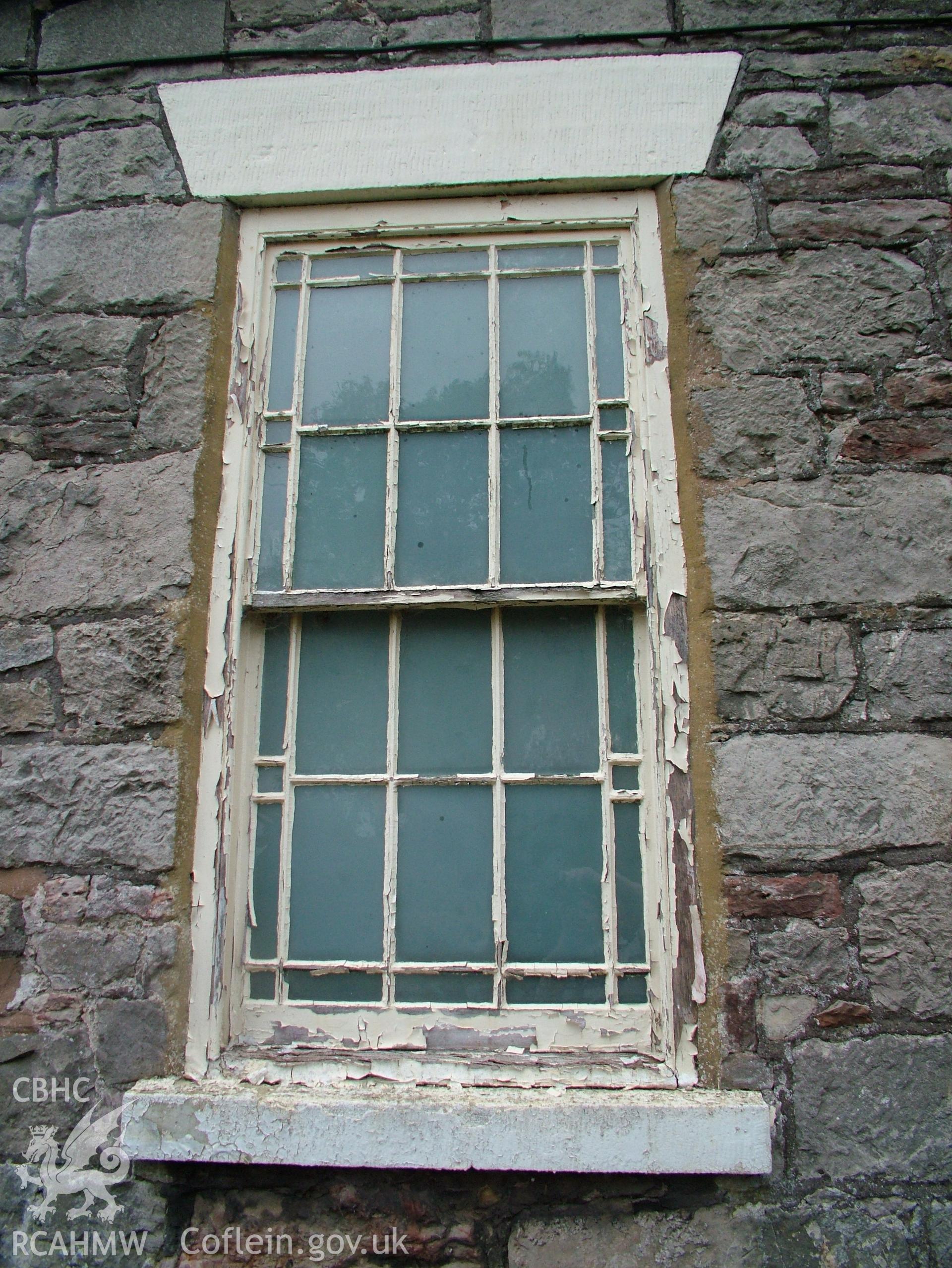 Digital colour photograph showing Llwynypandy chapel - exterior view showing window