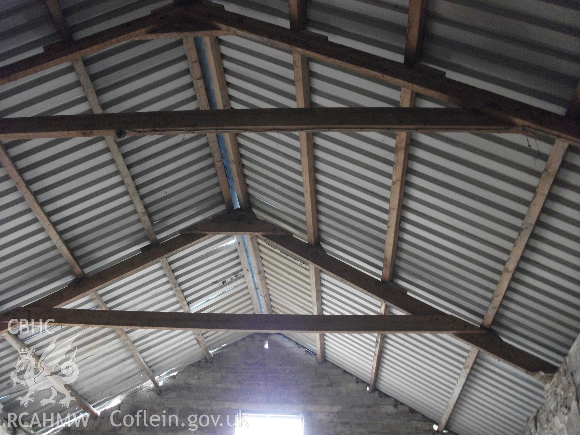 Colour digital photograph of interior of barn (metal roof) at Llangwm Isaf Farm, received in the course of Emergency Recording case ref no RCS2/1/1599.