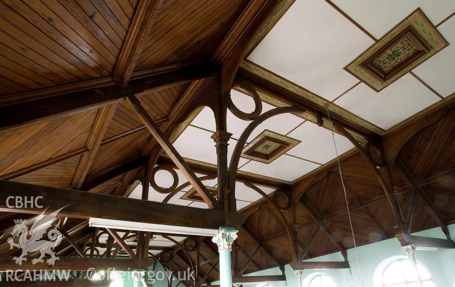 Hanbury Road baptist chapel, Bargoed, digital colour photograph showing roof detail showing the ornate trusses; lozenge pattern ceiling boarded; painted and stencilled ventilators, received in the course of Emergency Recording case ref no RCS2/1/2247.