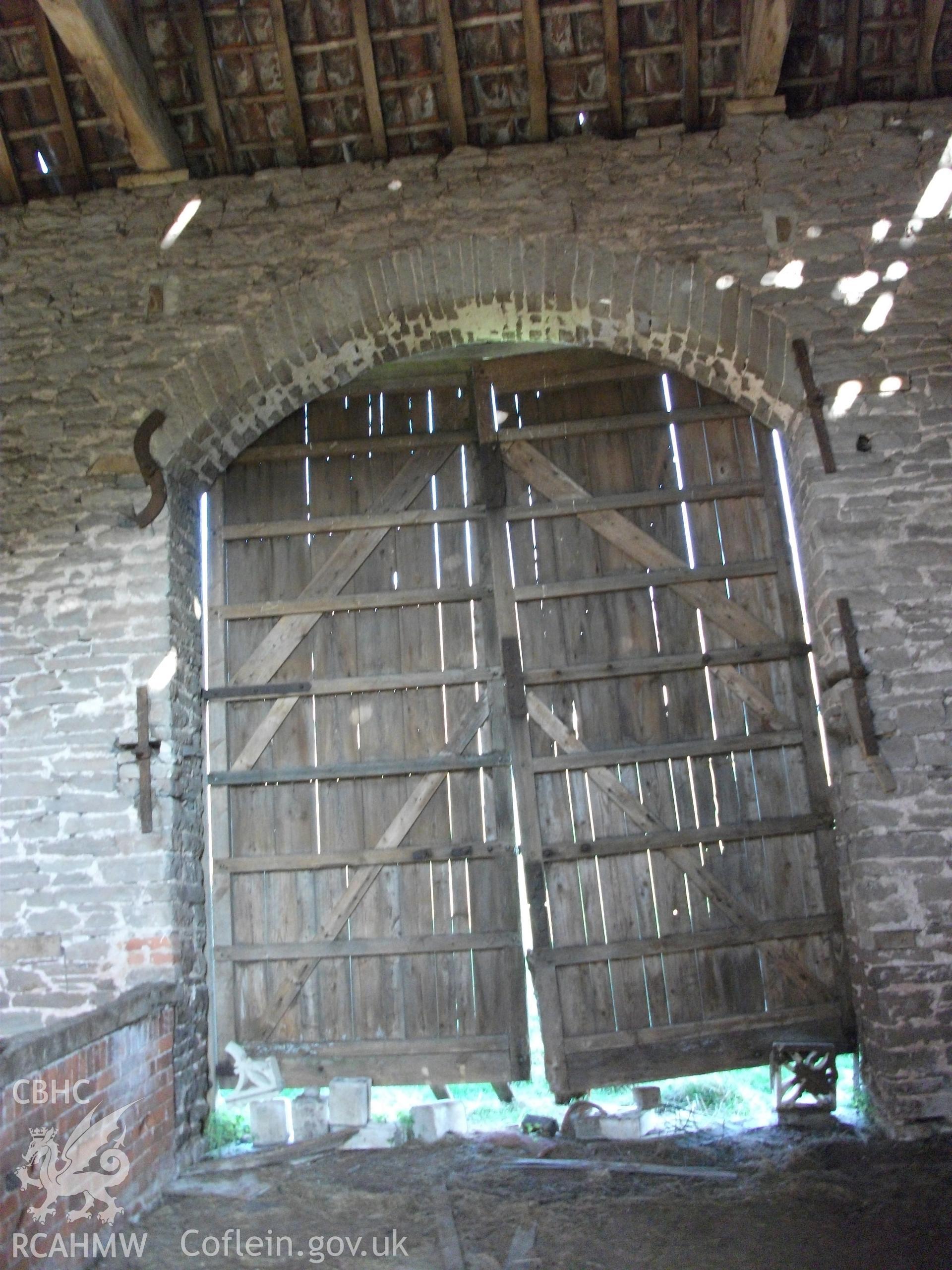 Colour digital photograph of interior of barn  - entrance; at Llangwm Isaf Farm, received in the course of Emergency Recording case ref no RCS2/1/1599.