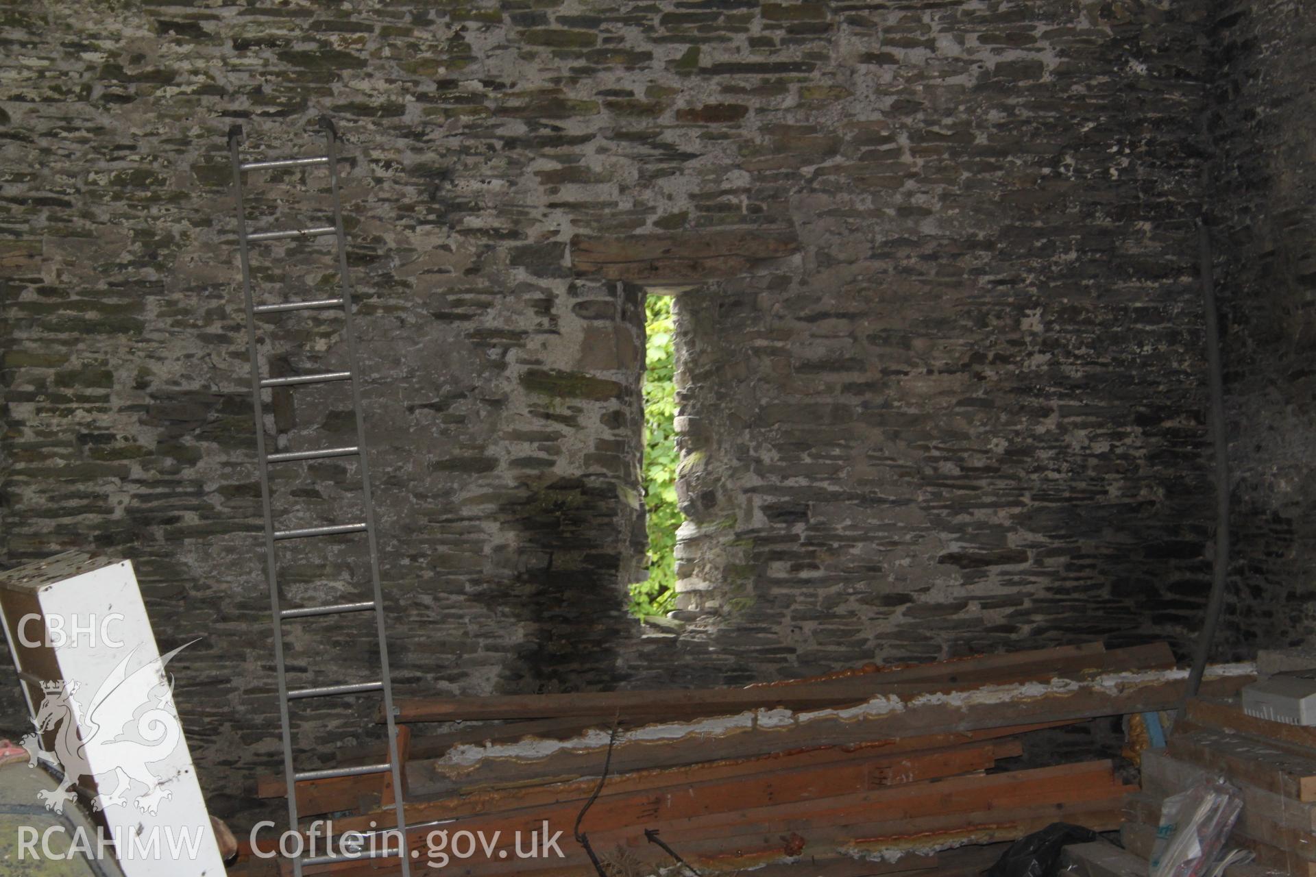 Pentre Farm: digital photograph showing interior of barn (slit window), received in the course of Emergency Recording case ref no RCS2/1/2780.